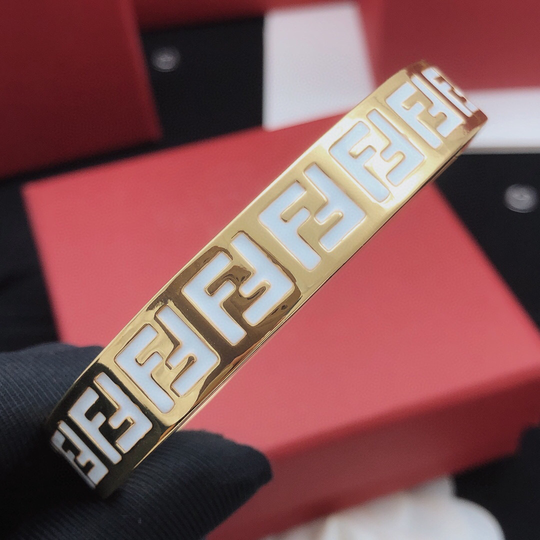 Fendi FF Logo Enamel Bangle bracelet gold-tone metal with white enamel 17cm inner circumference