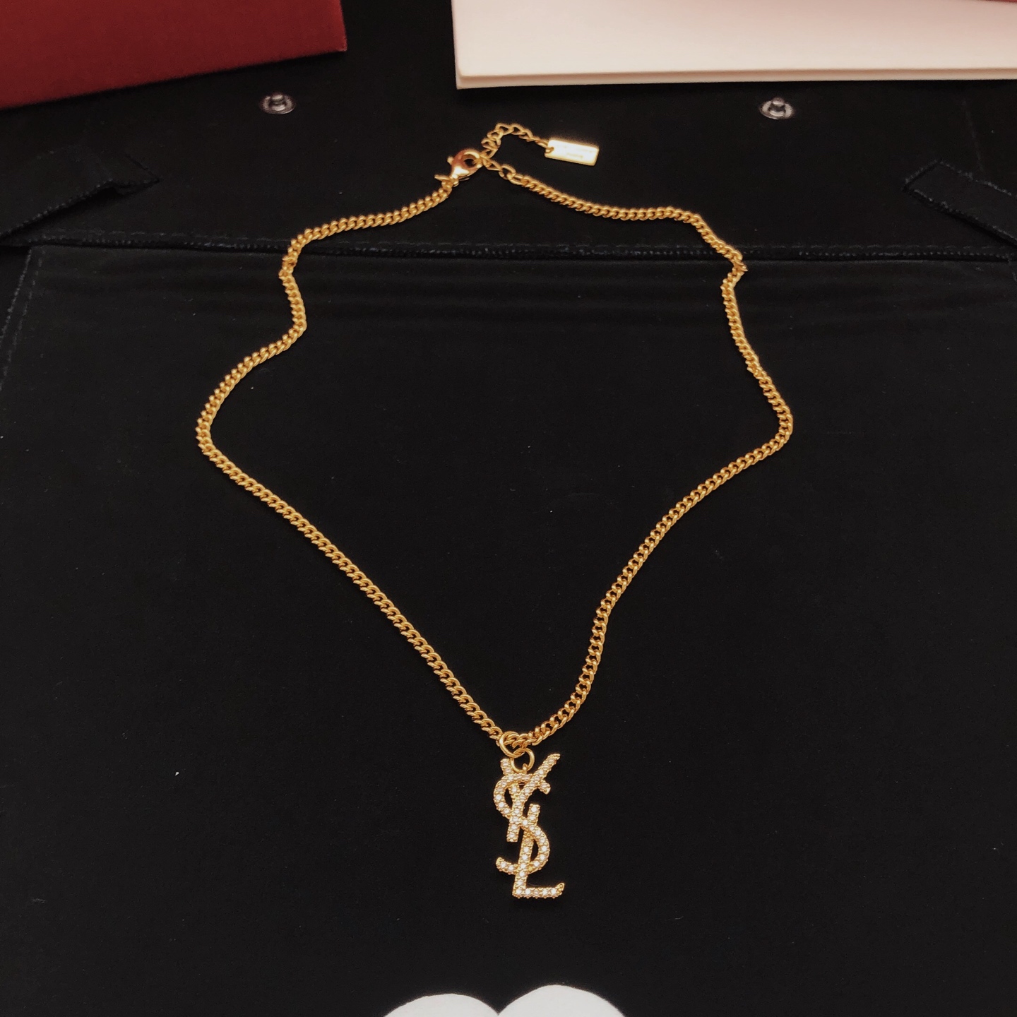 Saint Laurent YSL Monogram Crystal Pendant necklace gold-tone metal with clear crystal accents 45cm with 5cm extender