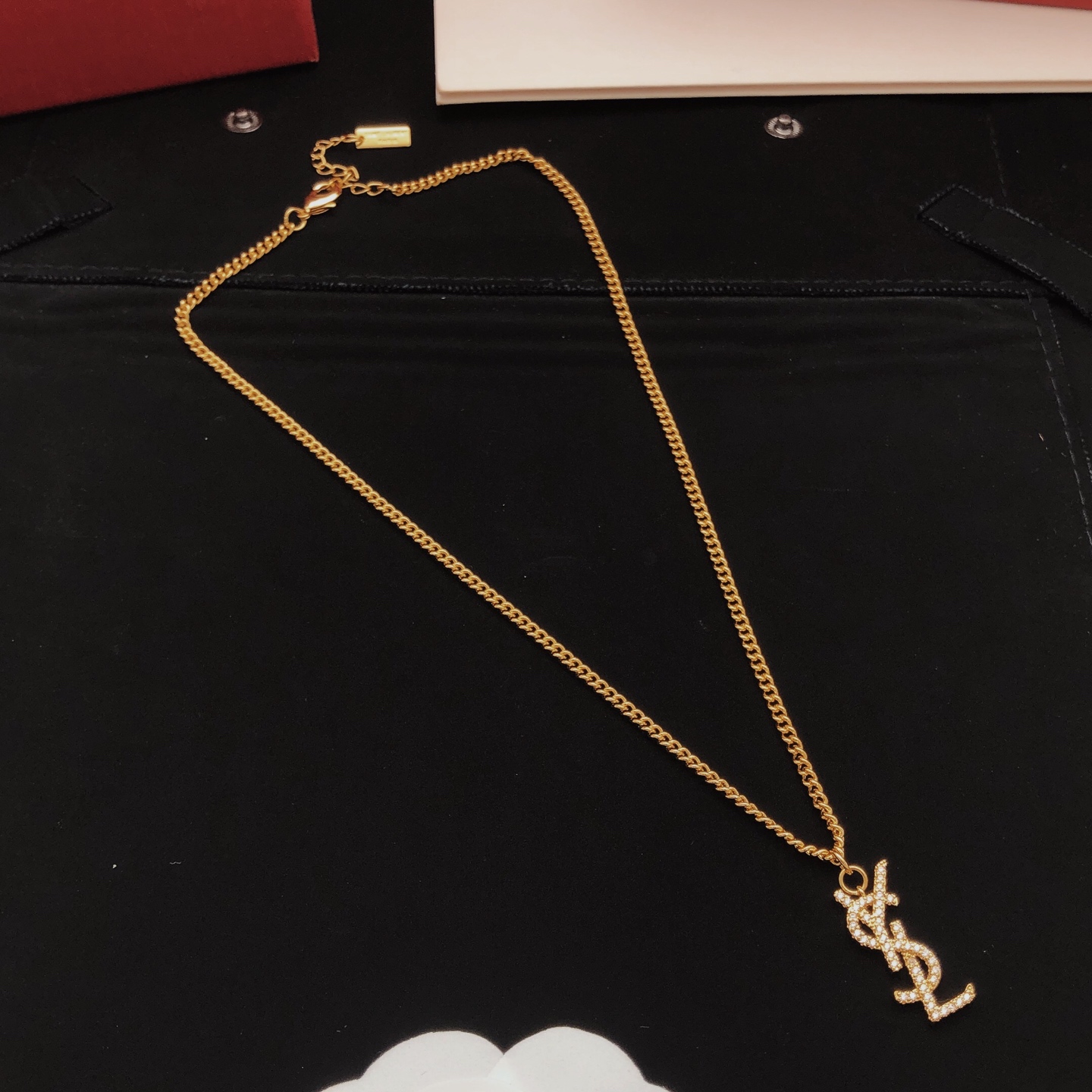 Saint Laurent YSL Monogram Crystal Pendant necklace gold-tone metal with clear crystal accents 45cm with 5cm extender
