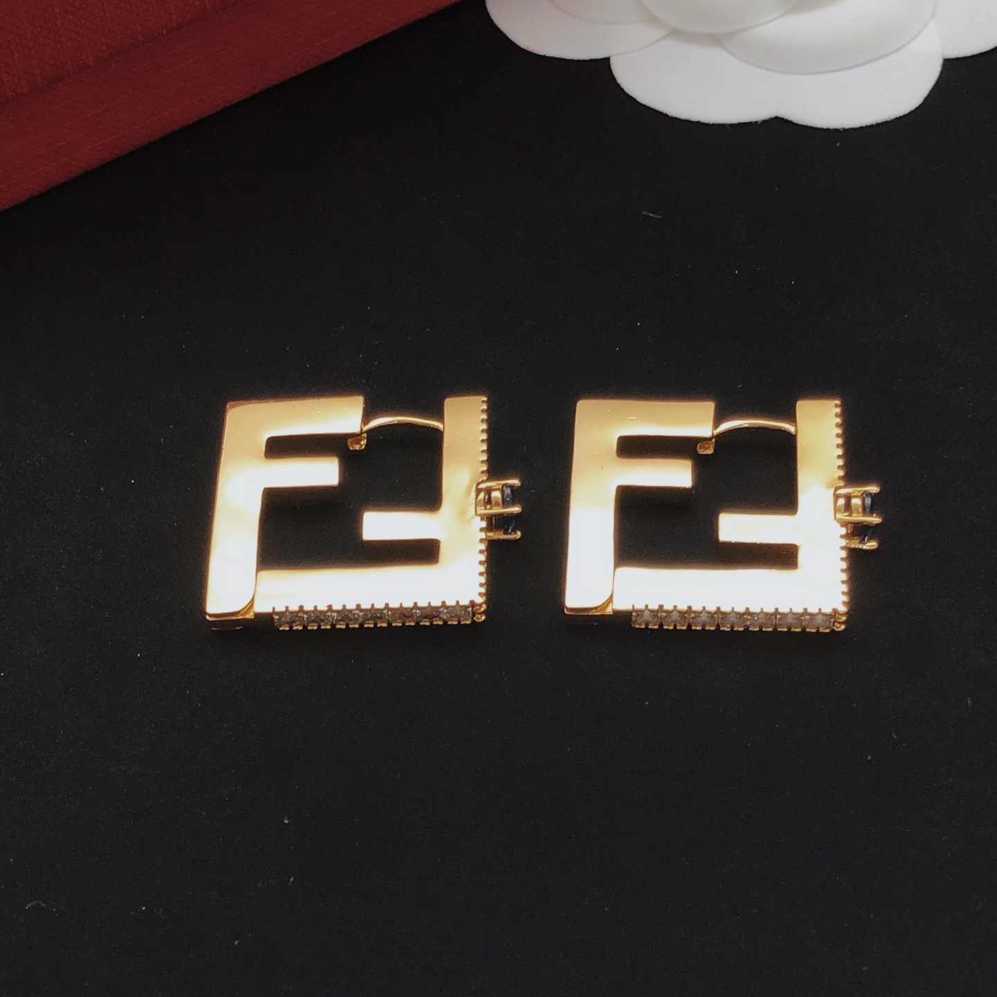 Fendi FF Logo Hoop Earrings earrings gold-tone metal with clear cubic zirconia and dark blue gemstone accents 2 5cm hoop diameter
