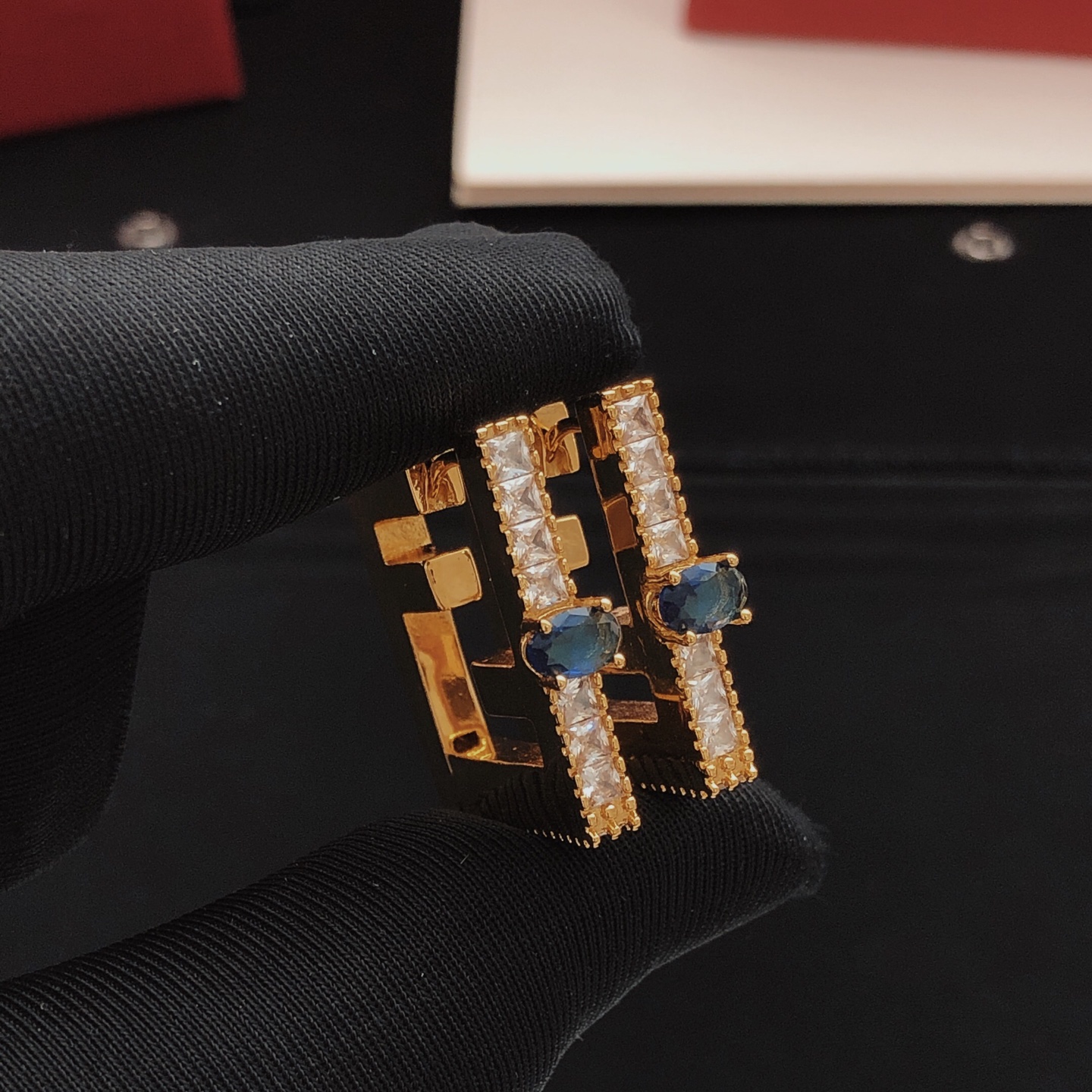 Fendi FF Logo Hoop Earrings earrings gold-tone metal with clear cubic zirconia and dark blue gemstone accents 2 5cm hoop diameter