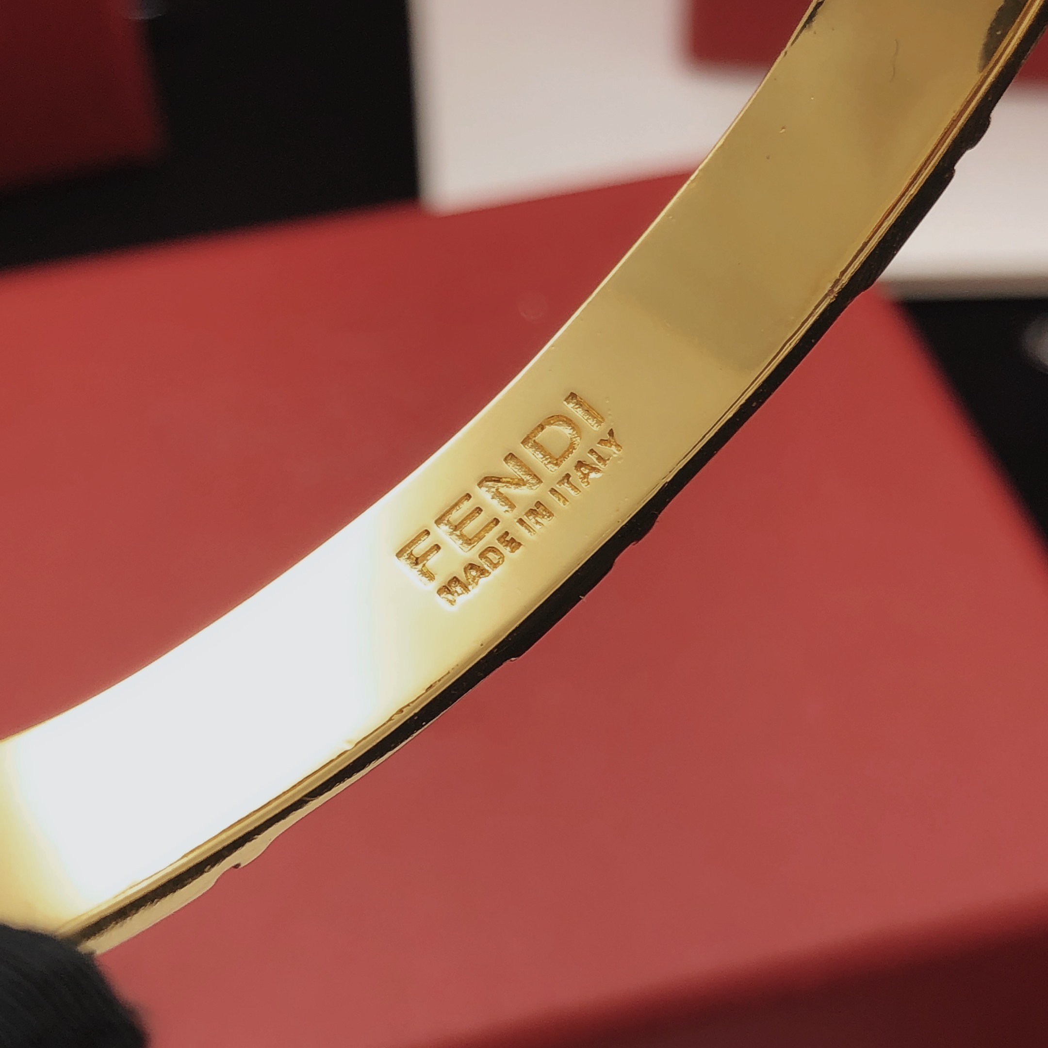 Fendi FF Logo Enamel Cuff bracelet Gold-tone metal with black enamel One Size standard open cuff 6 5cm inner diameter