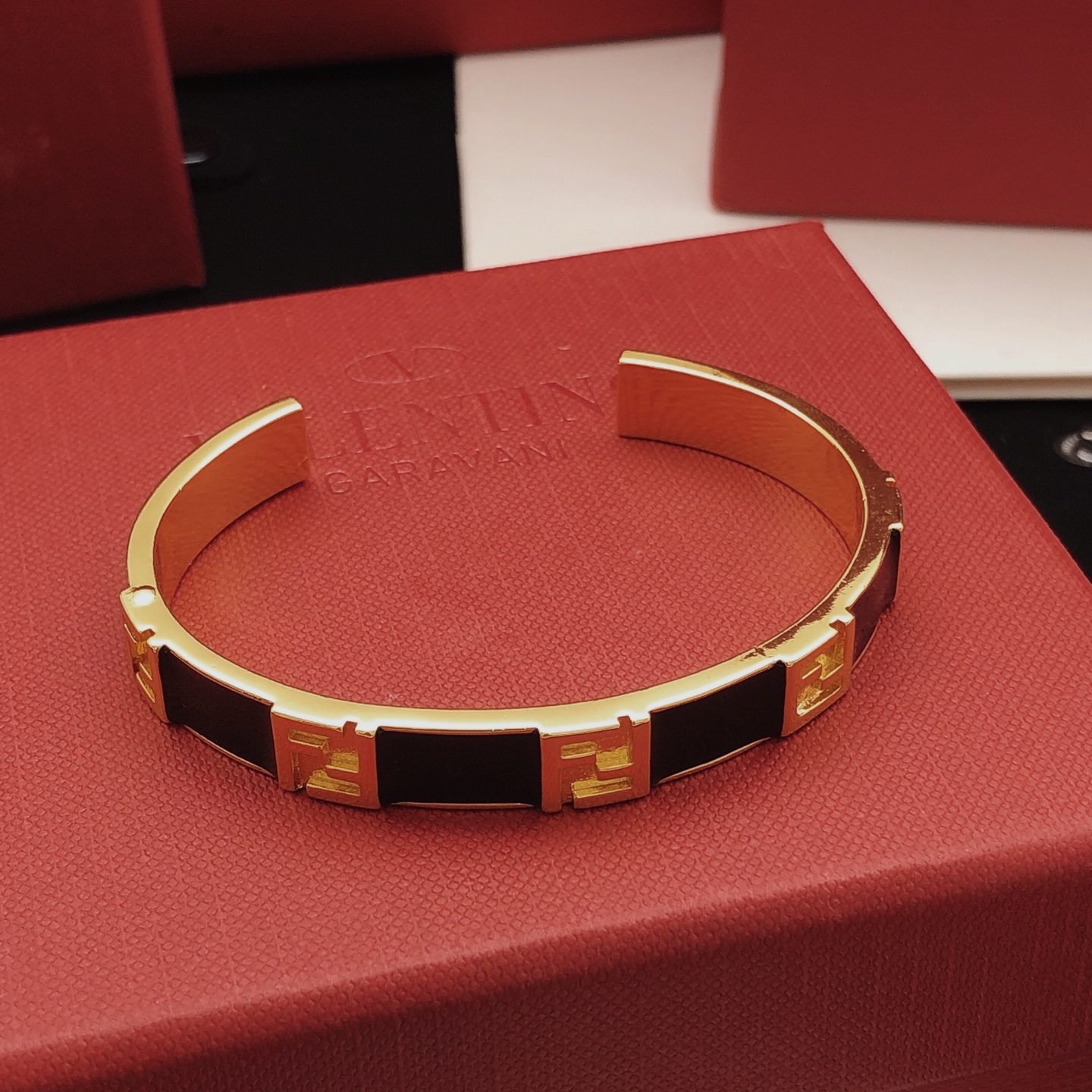 Fendi FF Logo Enamel Cuff bracelet Gold-tone metal with black enamel One Size standard open cuff 6 5cm inner diameter
