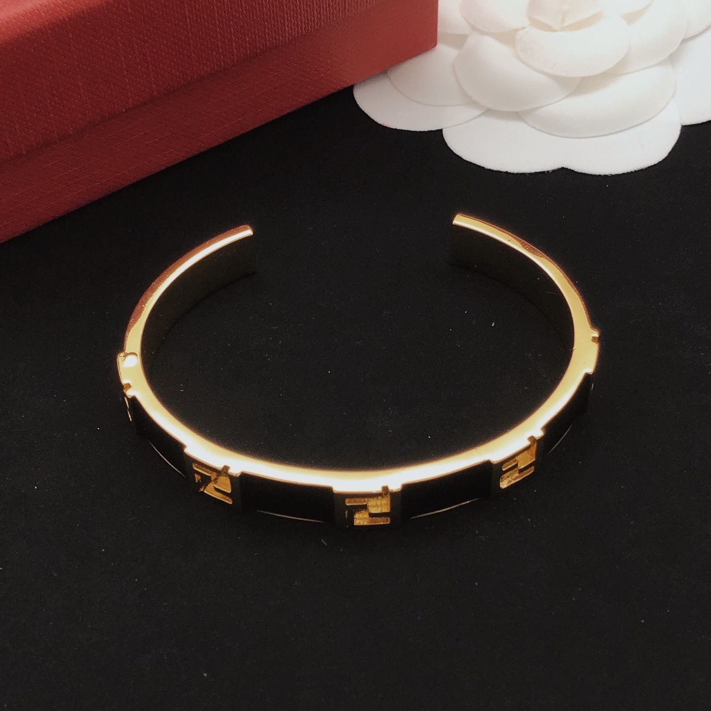 Fendi FF Logo Enamel Cuff bracelet Gold-tone metal with black enamel One Size standard open cuff 6 5cm inner diameter