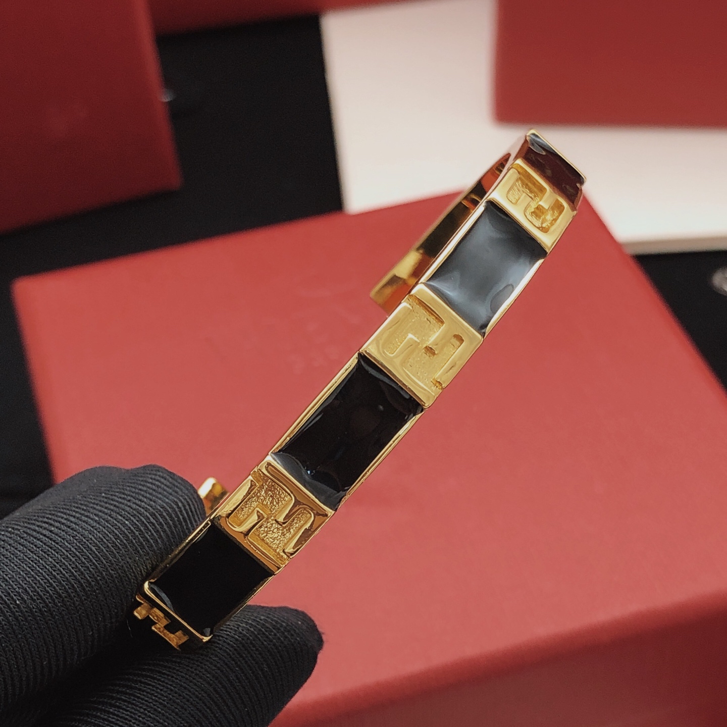 Fendi FF Logo Enamel Cuff bracelet Gold-tone metal with black enamel One Size standard open cuff 6 5cm inner diameter