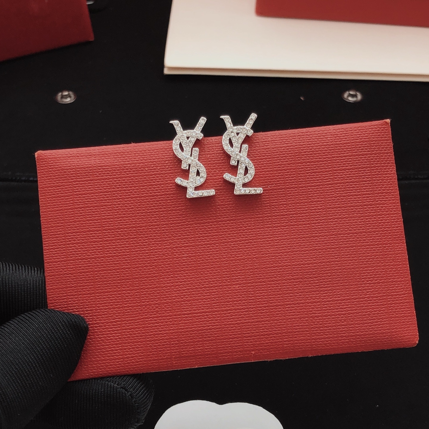 Saint Laurent YED0066 Cassandre Monogram earrings silver-toned metal with clear crystal accents 2cm length