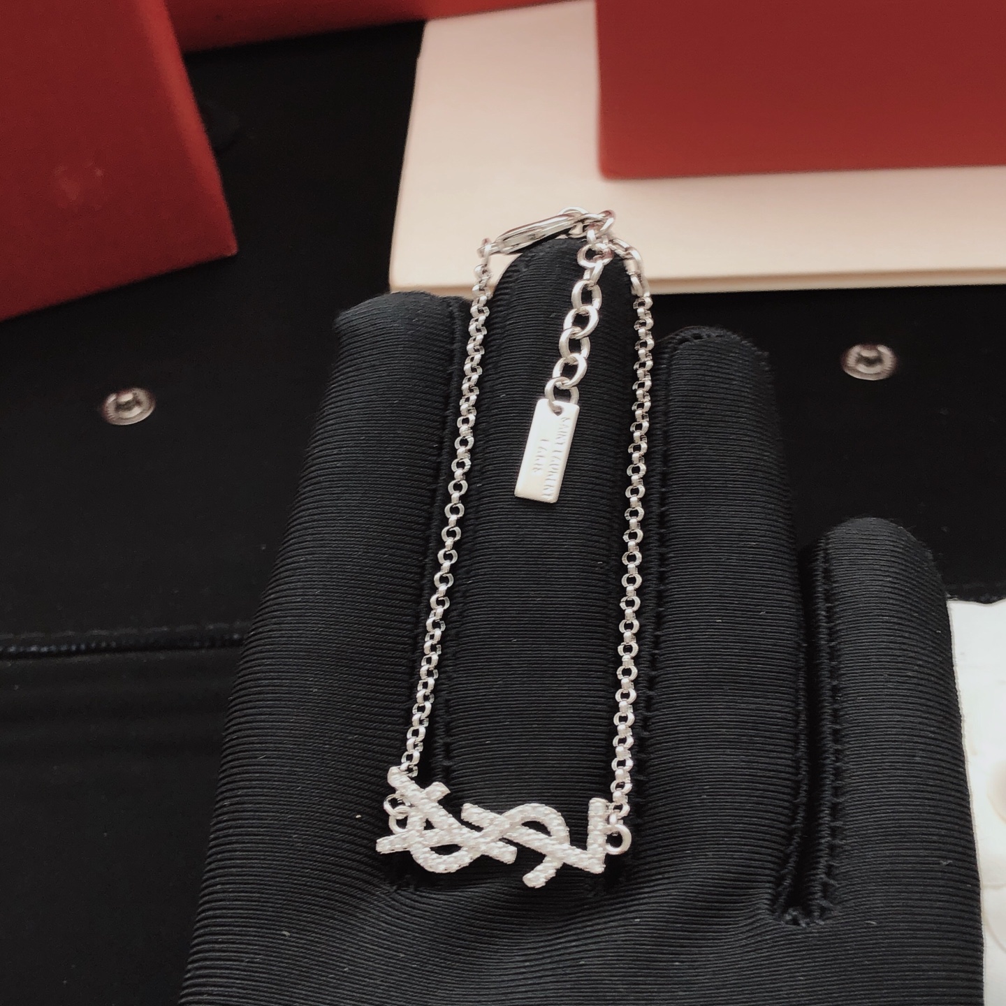 Saint Laurent YSL Monogram Crystal Charm Bracelet bracelet silver-toned metal with clear crystal accents 18cm with 3cm extender