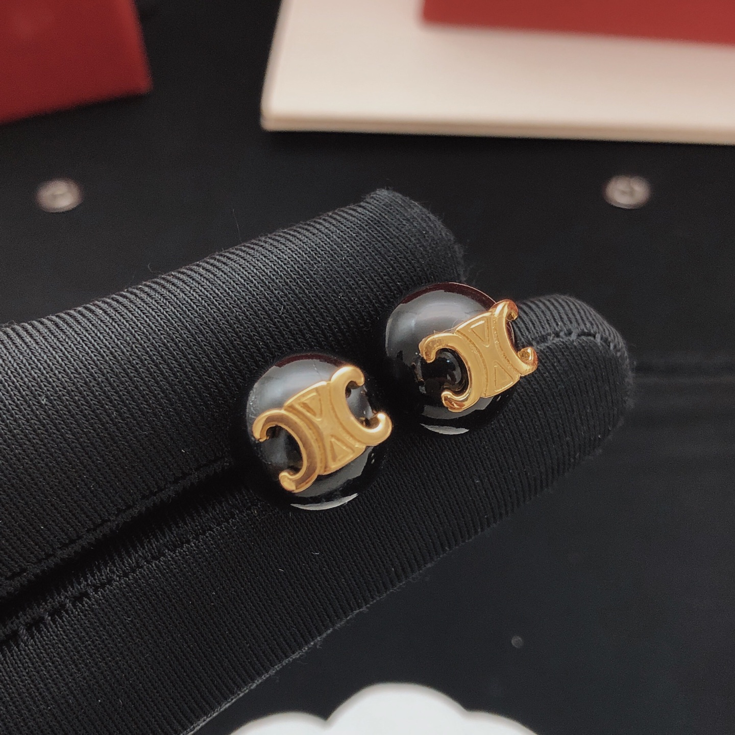 Celine Triomphe earrings gold-tone metal with black resin beads 10mm bead diameter