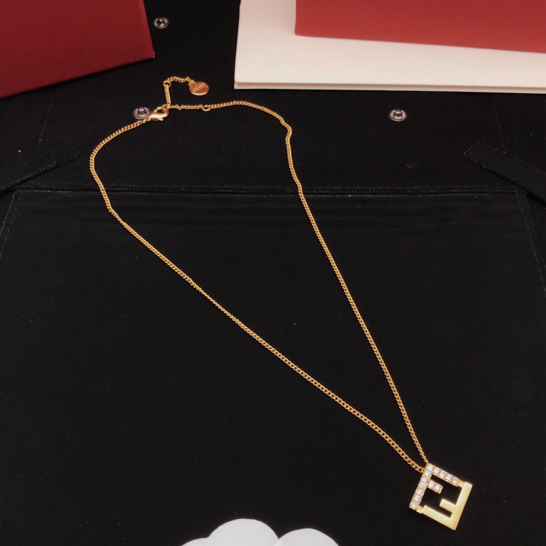 Fendi FF Logo Pendant necklace gold-tone metal with clear cubic zirconia stones 45cm with 5cm extender