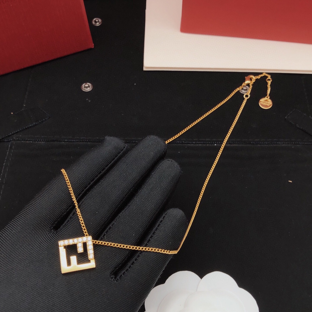 Fendi FF Logo Pendant necklace gold-tone metal with clear cubic zirconia stones 45cm with 5cm extender