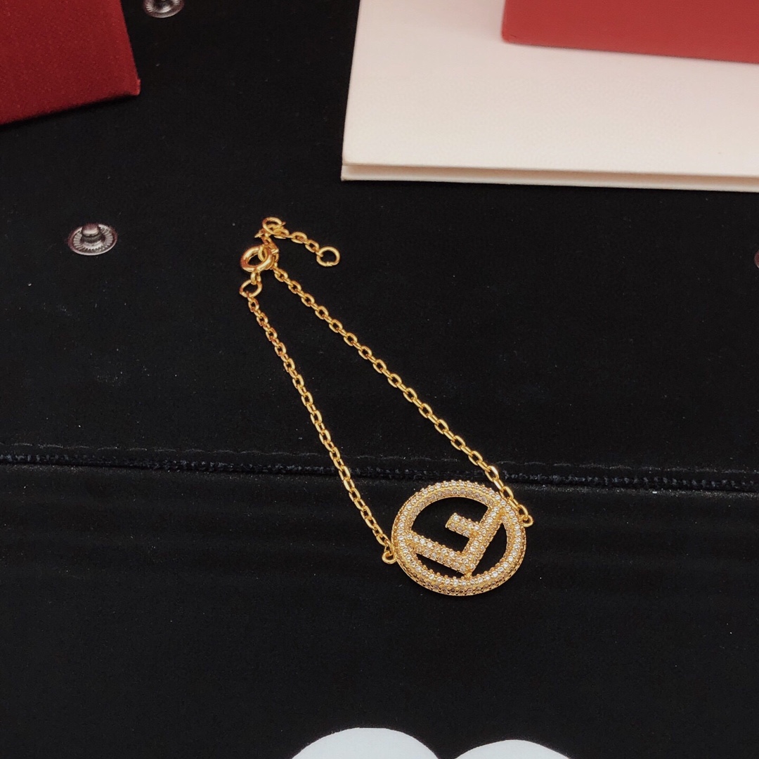 Fendi F is Fendi Crystal Logo Bracelet bracelet gold-tone metal with clear crystal pave 17cm with 2cm extender