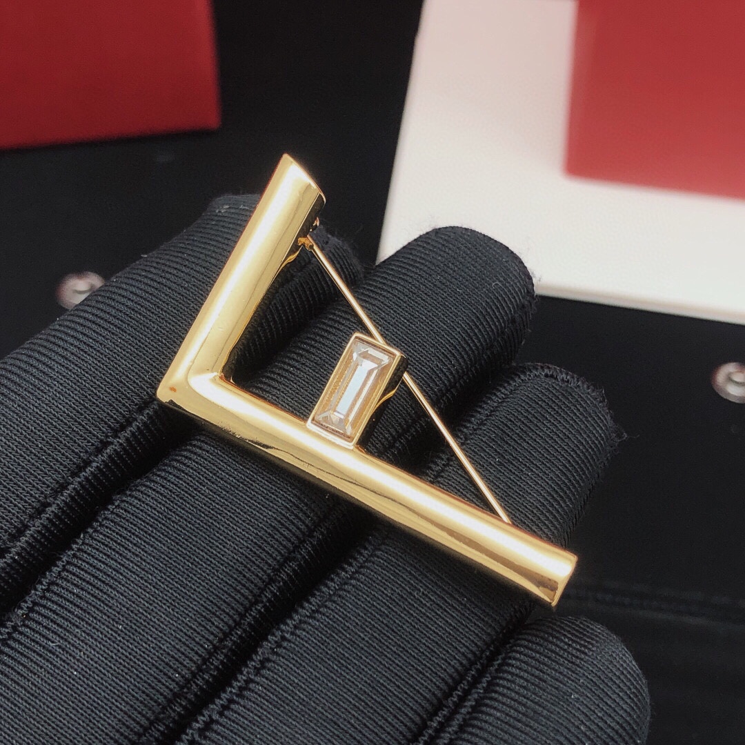 Fendi FF Logo Crystal Brooch brooch gold-tone metal with clear baguette-cut crystal 4 5cm width
