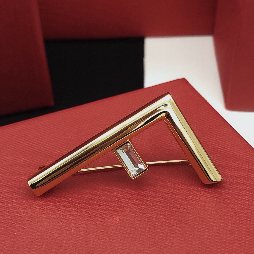 Fendi FF Logo Crystal Brooch brooch gold-tone metal with clear baguette-cut crystal 4 5cm width