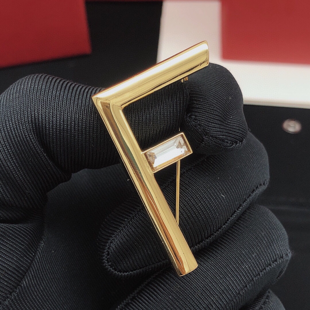 Fendi FF Logo Crystal Brooch brooch gold-tone metal with clear baguette-cut crystal 4 5cm width