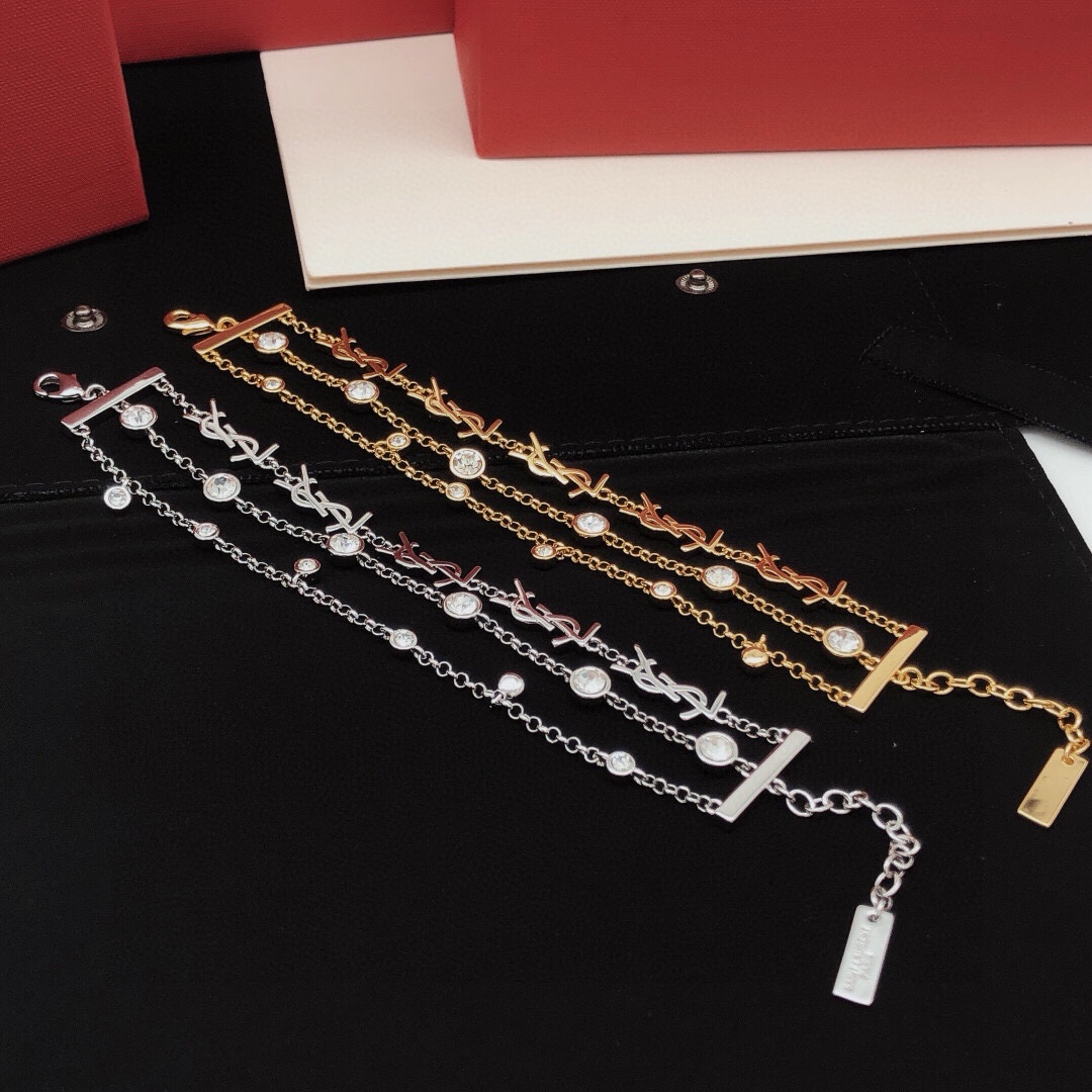 Saint Laurent YSL Monogram Multi-Strand Crystal Bracelet bracelet gold-tone metal with clear faceted crystals 19cm with 3cm extension chain