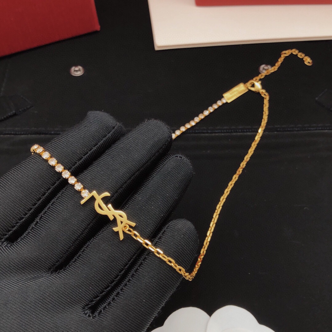 Saint Laurent Cassandre Crystal Chain necklace gold-tone metal with clear crystal accents 40cm with 5cm extender