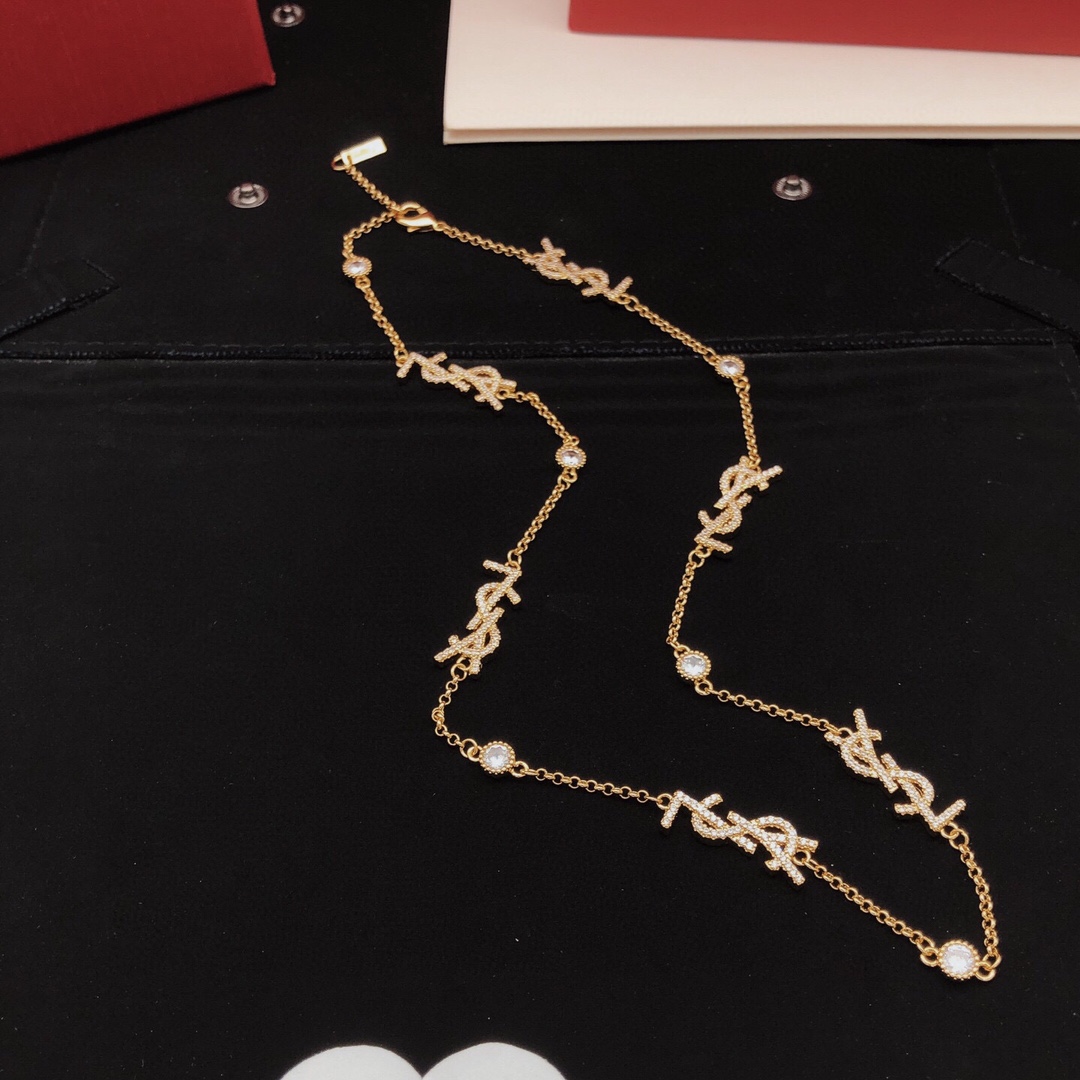 Saint Laurent YSL Monogram Multi-Logo Crystal Station Necklace necklace gold-tone metal with clear crystal accents 42cm with 5cm extender