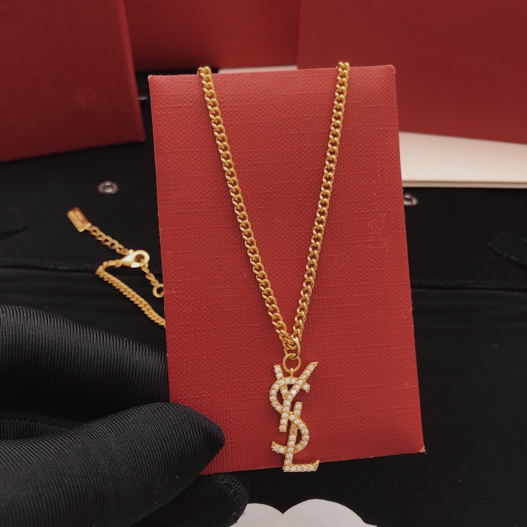 Saint Laurent YSL Monogram Crystal Pendant Necklace necklace gold-tone metal with clear crystal pave 45cm with 5cm extender