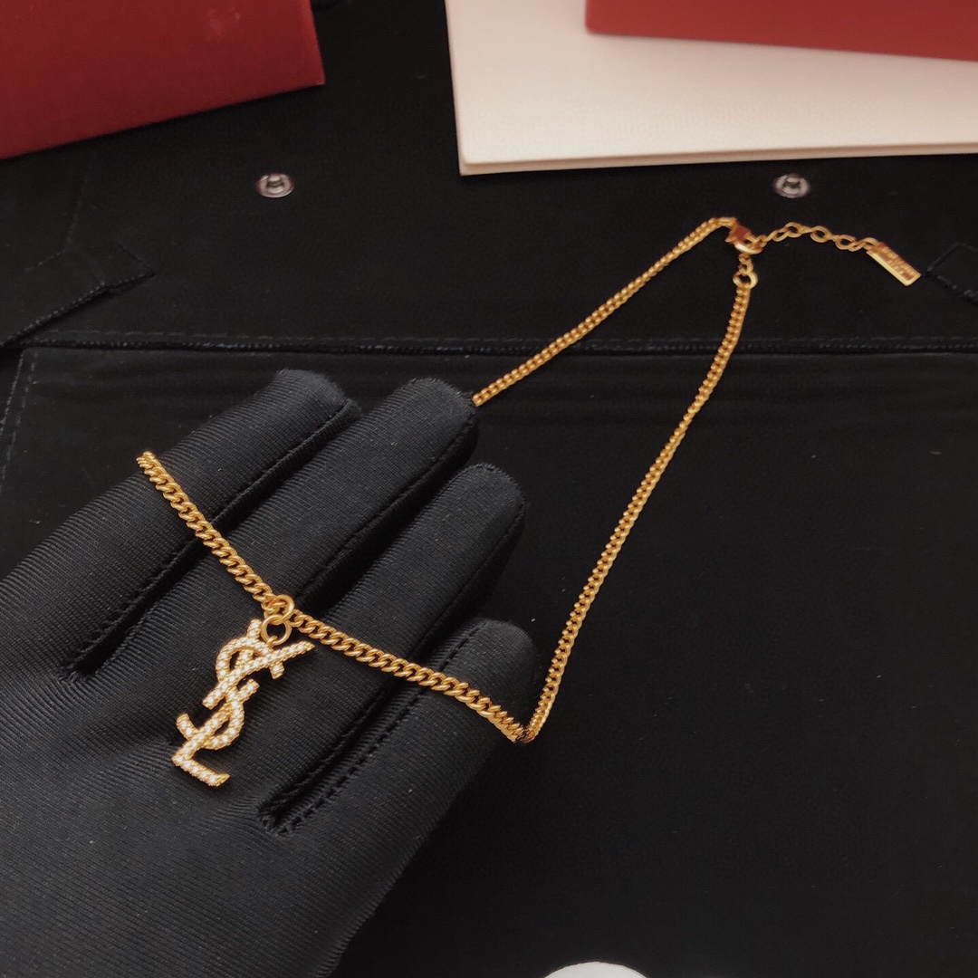 Saint Laurent YSL Monogram Crystal Pendant Necklace necklace gold-tone metal with clear crystal pave 45cm with 5cm extender