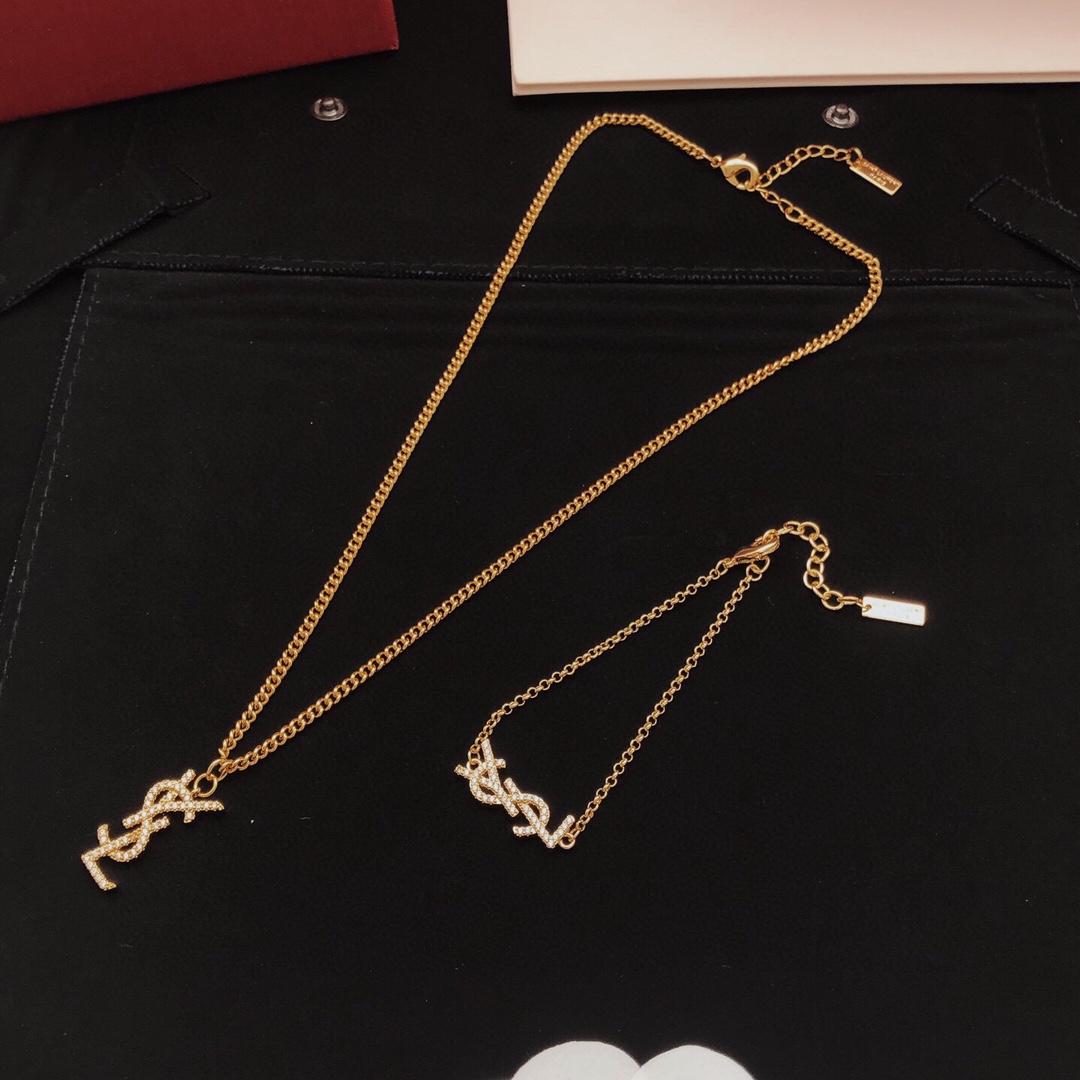 Saint Laurent YSL Monogram Crystal Pendant Necklace necklace gold-tone metal with clear crystal pave 45cm with 5cm extender