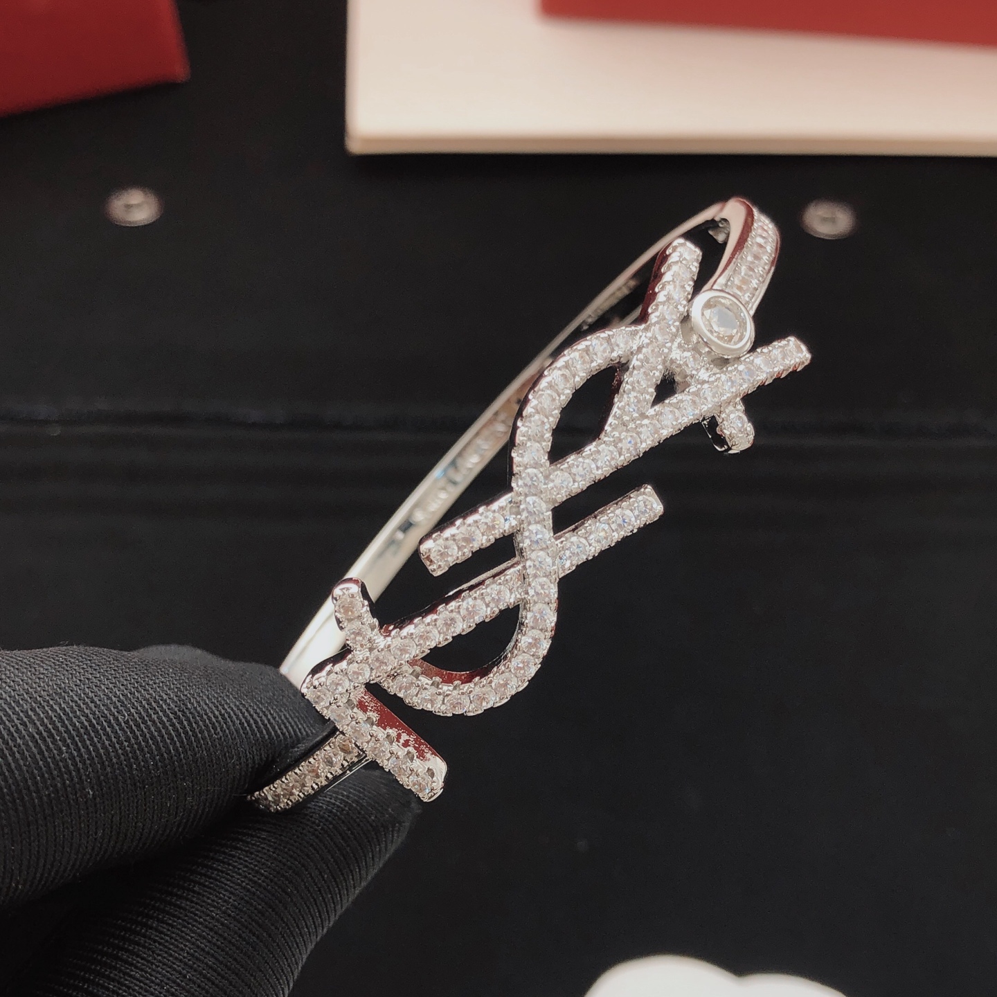 Saint Laurent Cassandre Monogram Pave Bangle bracelet silver-toned metal with clear pave crystals 17cm inner circumference