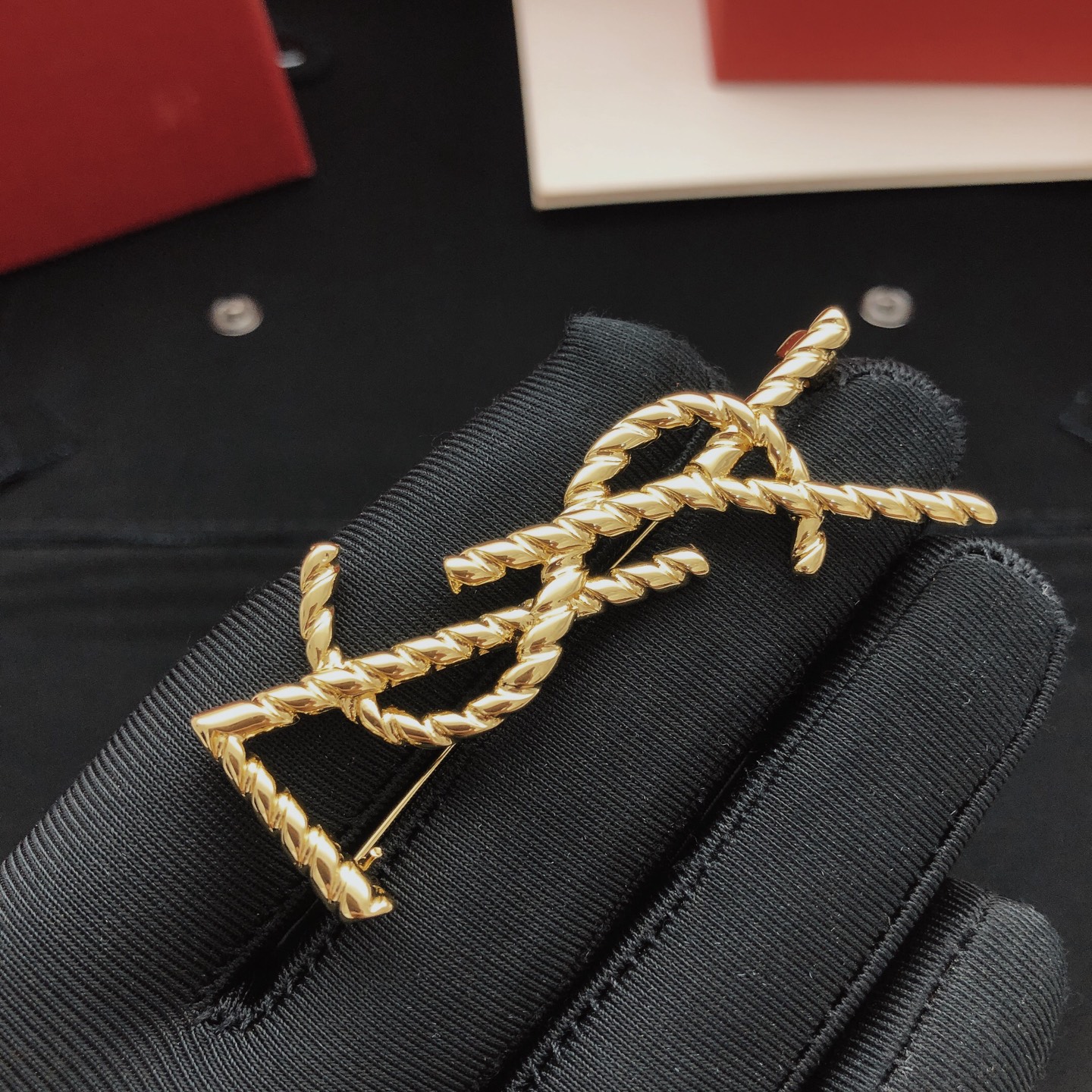 Saint Laurent Cassandre Twisted Monogram Brooch brooch gold-tone metal no gemstones 4 5cm height