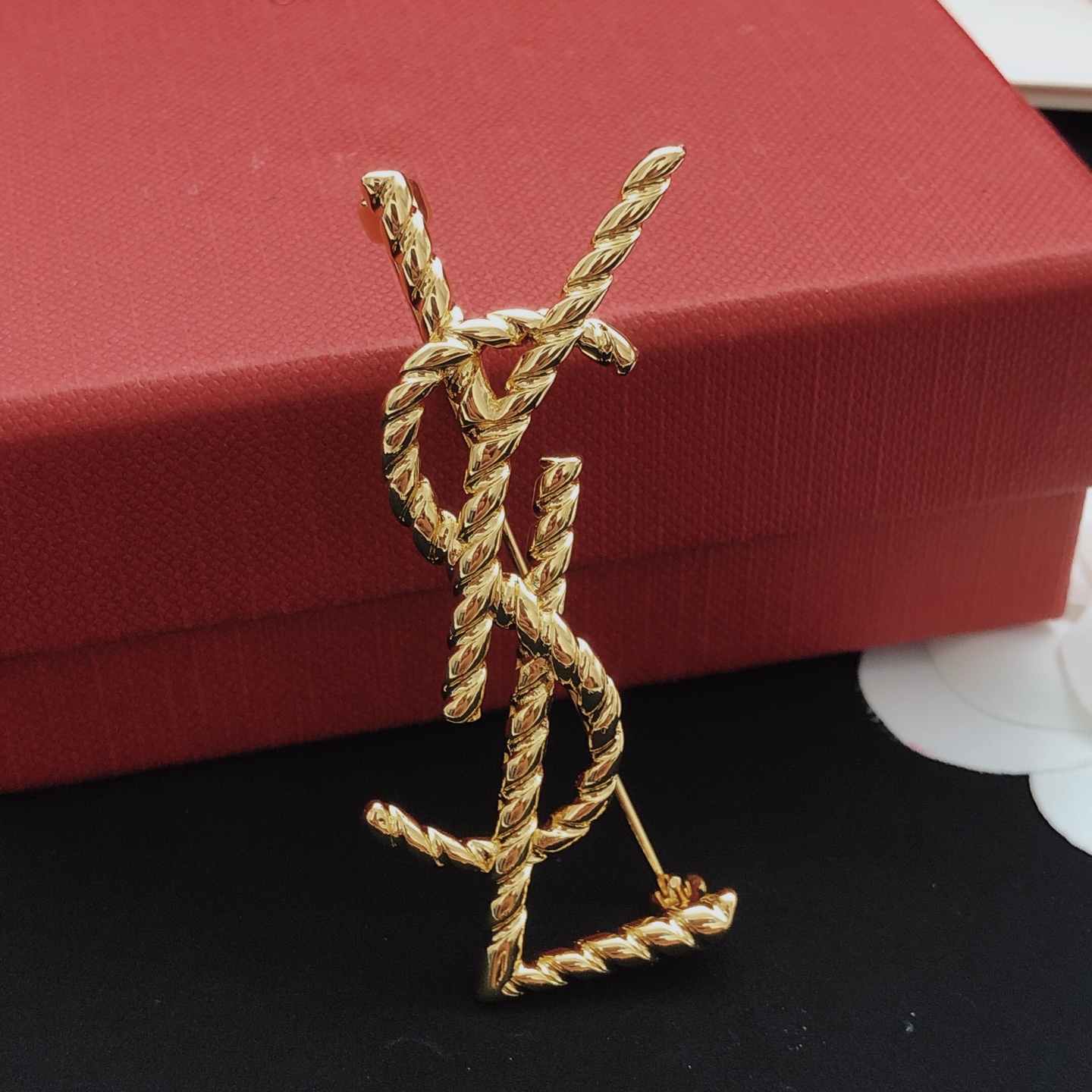 Saint Laurent Cassandre Twisted Monogram Brooch brooch gold-tone metal no gemstones 4 5cm height