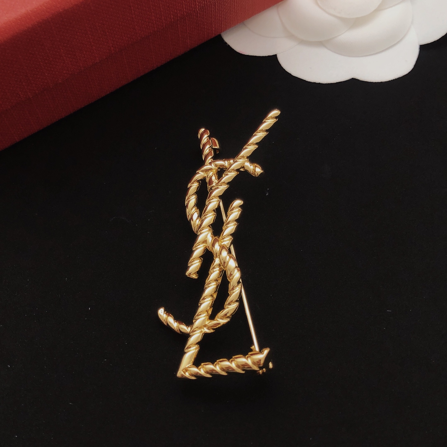 Saint Laurent Cassandre Twisted Monogram Brooch brooch gold-tone metal no gemstones 4 5cm height