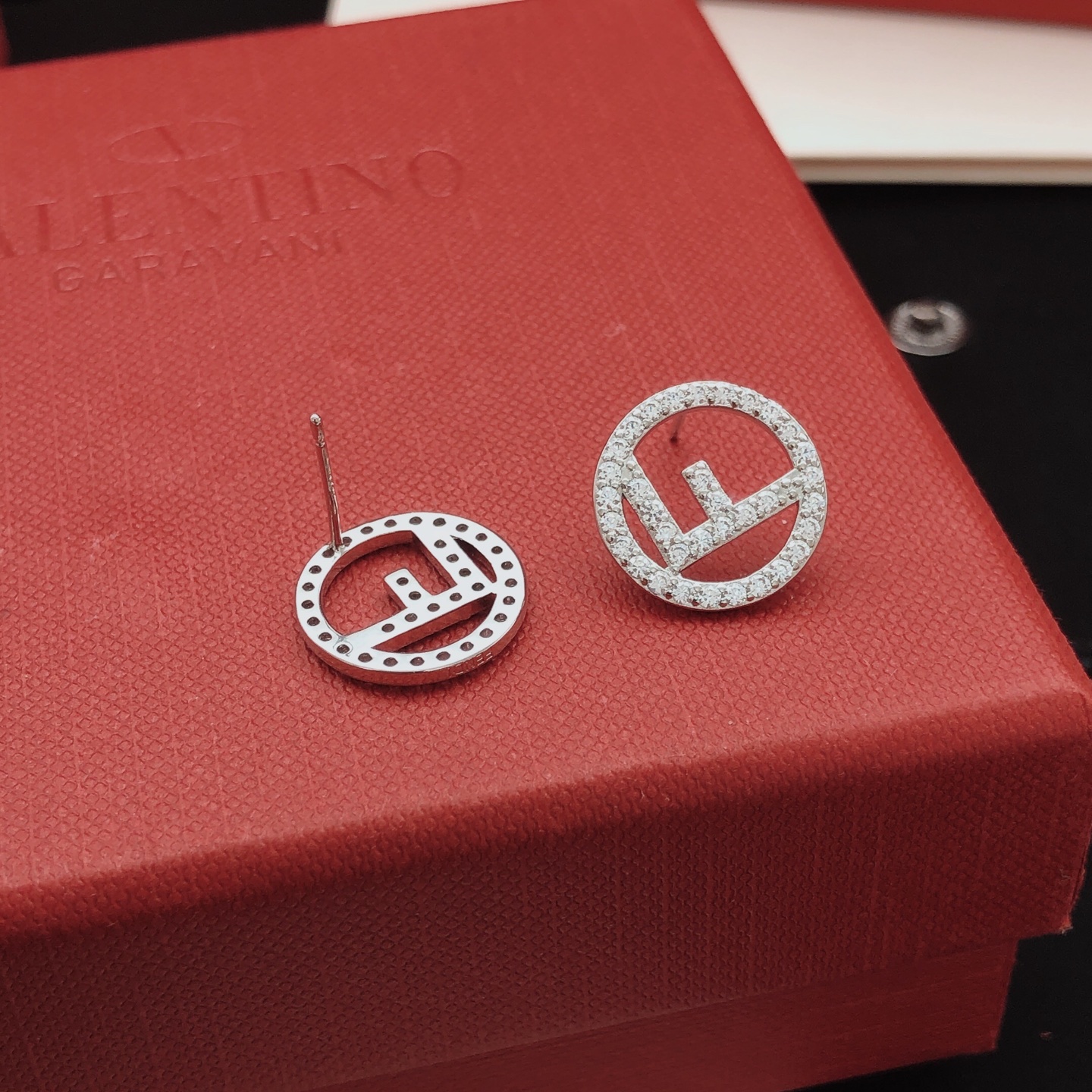 Fendi F is Fendi earrings silver-toned metal with clear pave crystals 1 2cm diameter