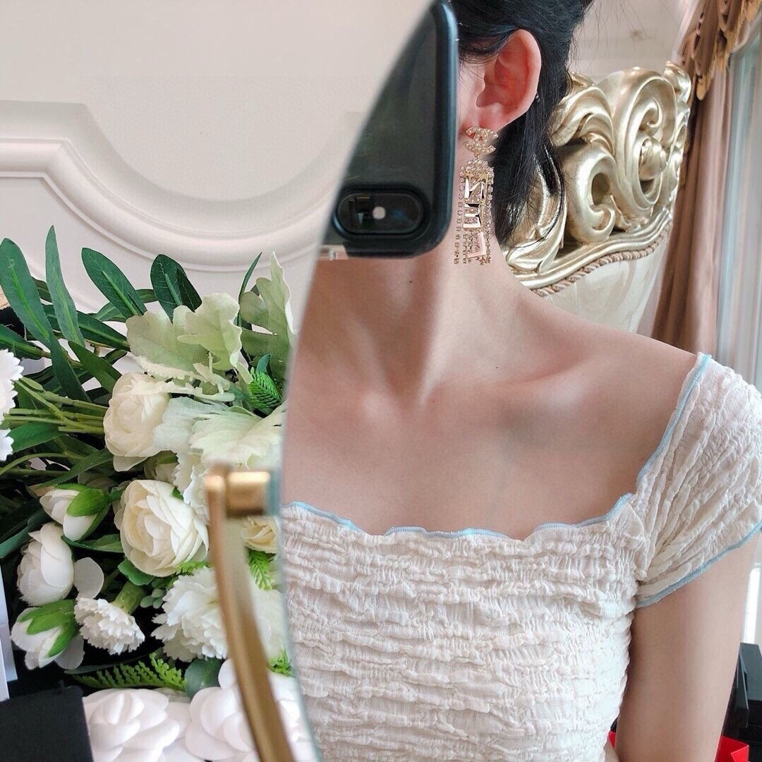 Chanel CHA-NEL Letter Crystal Fringe Drop Earrings earrings gold-tone metal white faux pearl clear crystal 6 5cm drop length