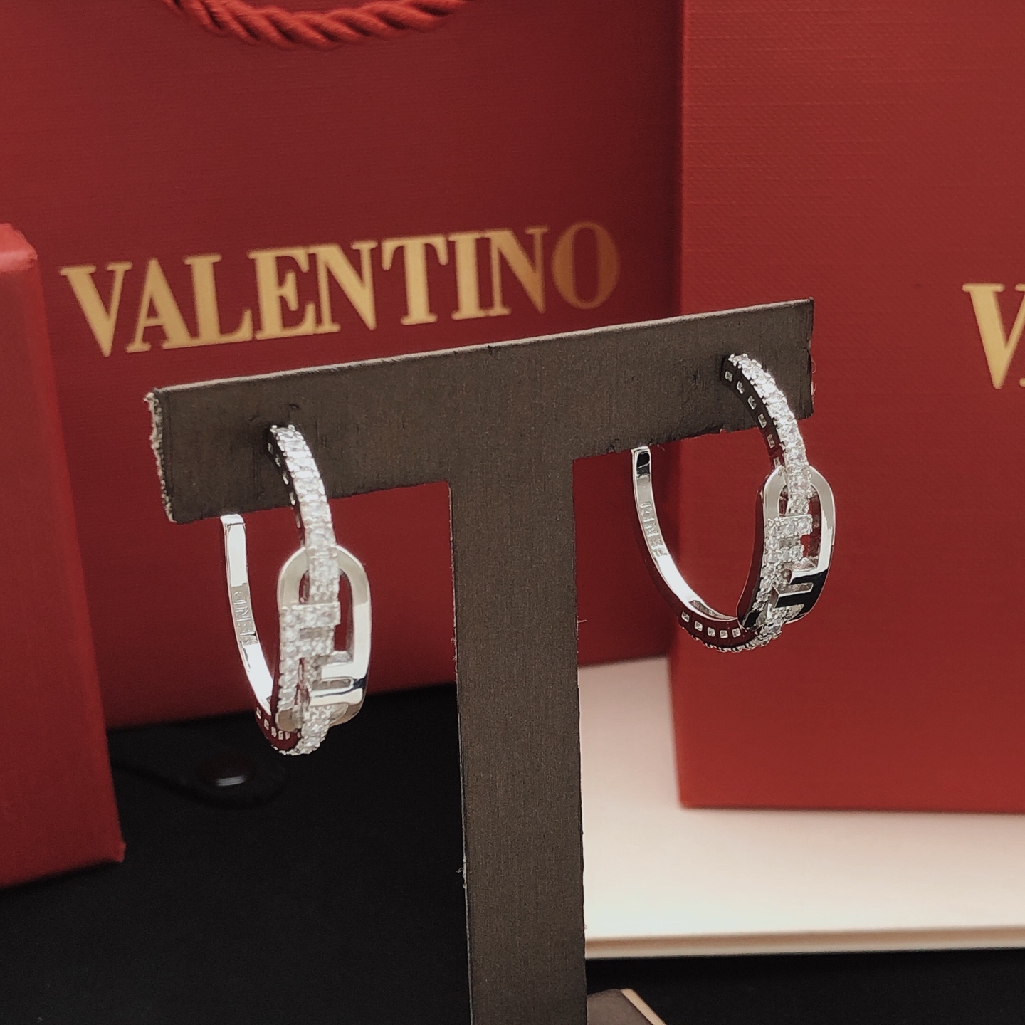 Valentino VLogo Signature Crystal Hoop earrings silver-toned metal with clear crystal accents 2 5cm diameter