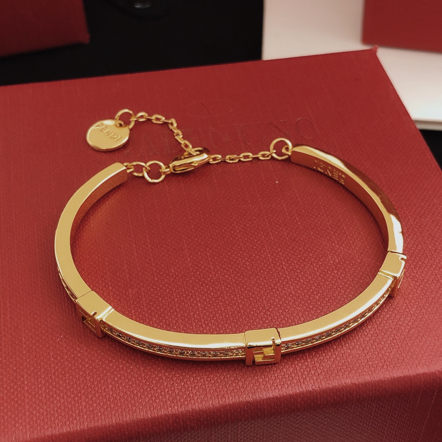 Fendi FF Logo Crystal Bangle bracelet gold-tone metal with clear faceted crystals 17cm inner circumference