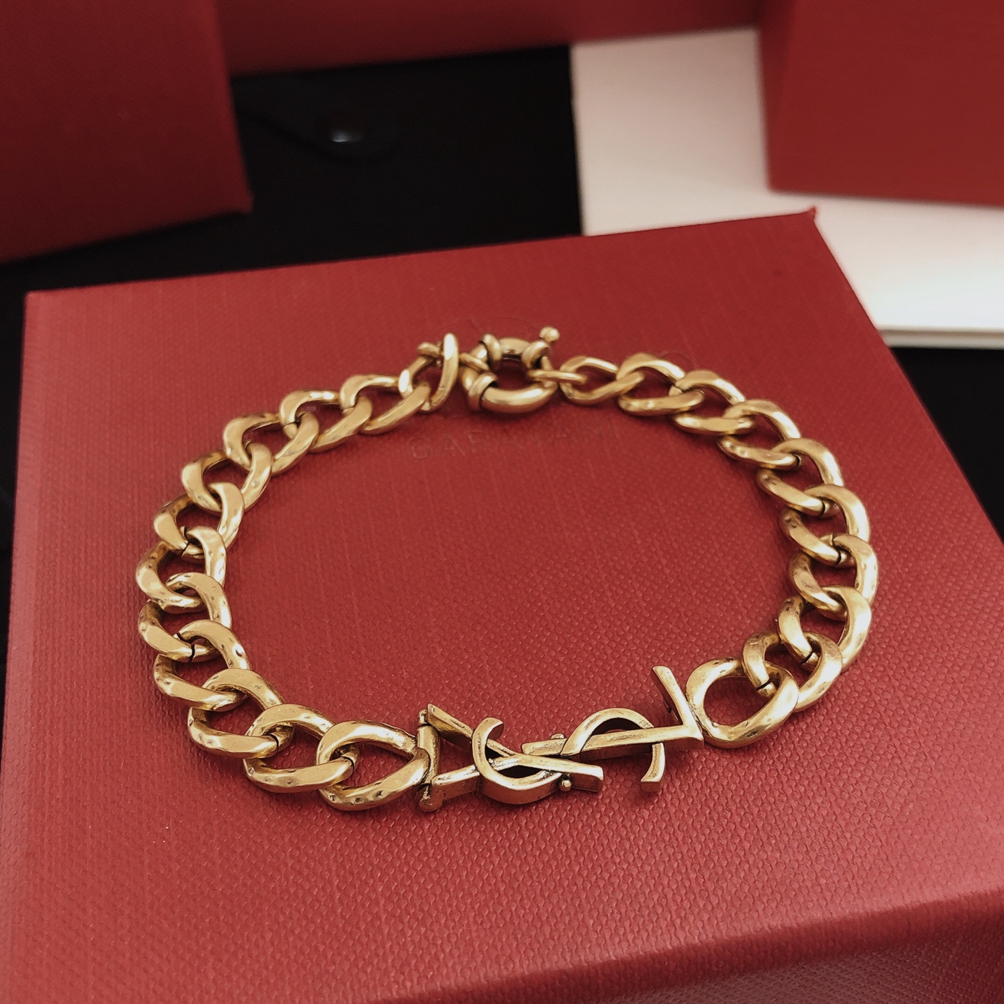 Saint Laurent Cassandre YSL Logo Curb Chain bracelet vintage gold tone metal no accent stones 19cm