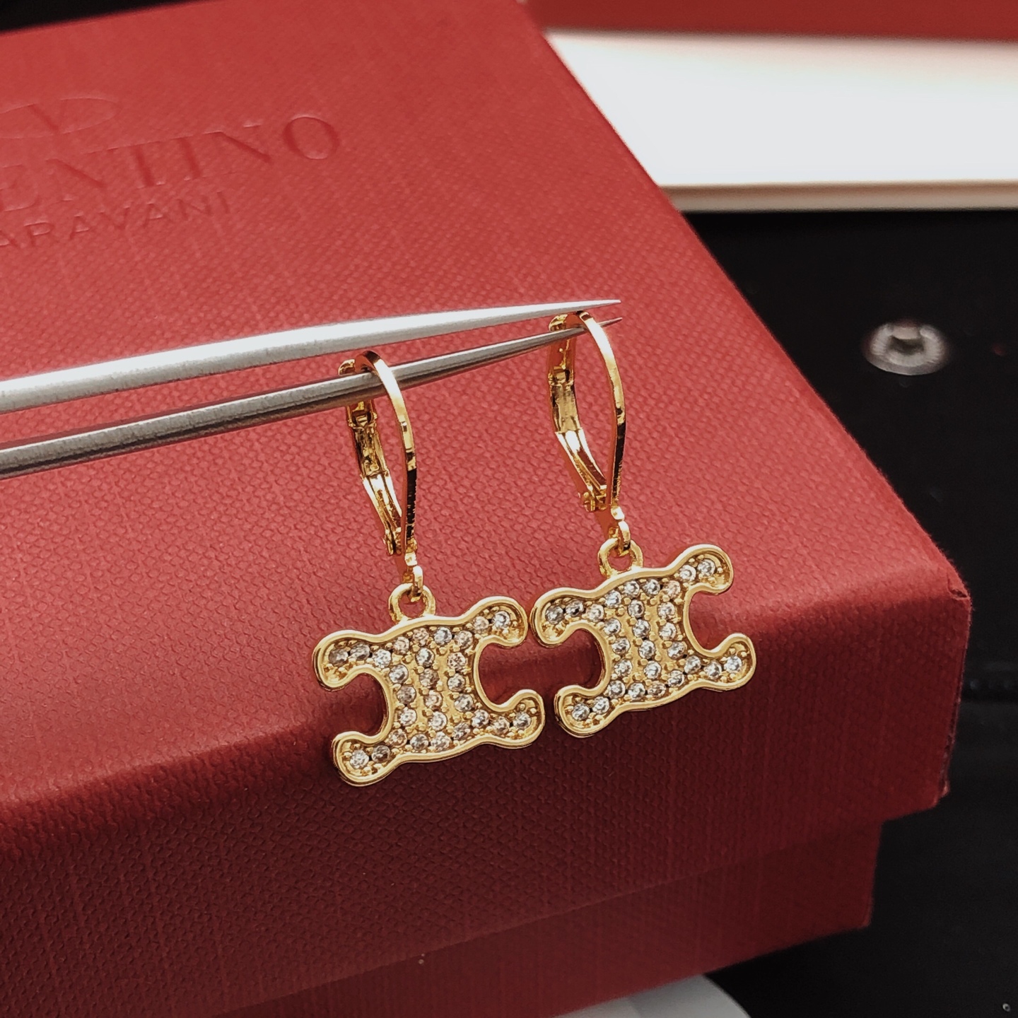 Celine Triomphe earrings gold-tone metal with clear crystal accents 1 5cm drop