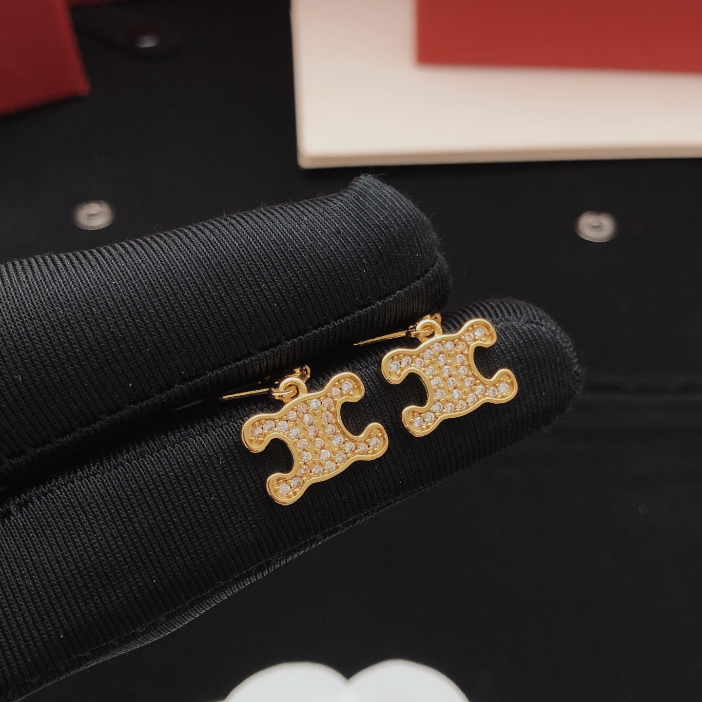 Celine Triomphe earrings gold-tone metal with clear crystal accents 1 5cm drop