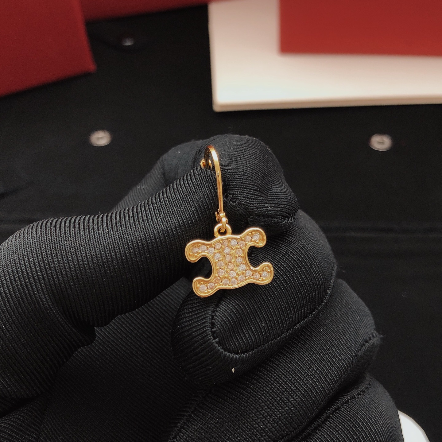 Celine Triomphe earrings gold-tone metal with clear crystal accents 1 5cm drop