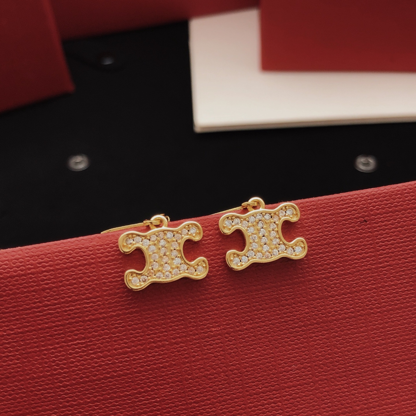 Celine Triomphe earrings gold-tone metal with clear crystal accents 1 5cm drop