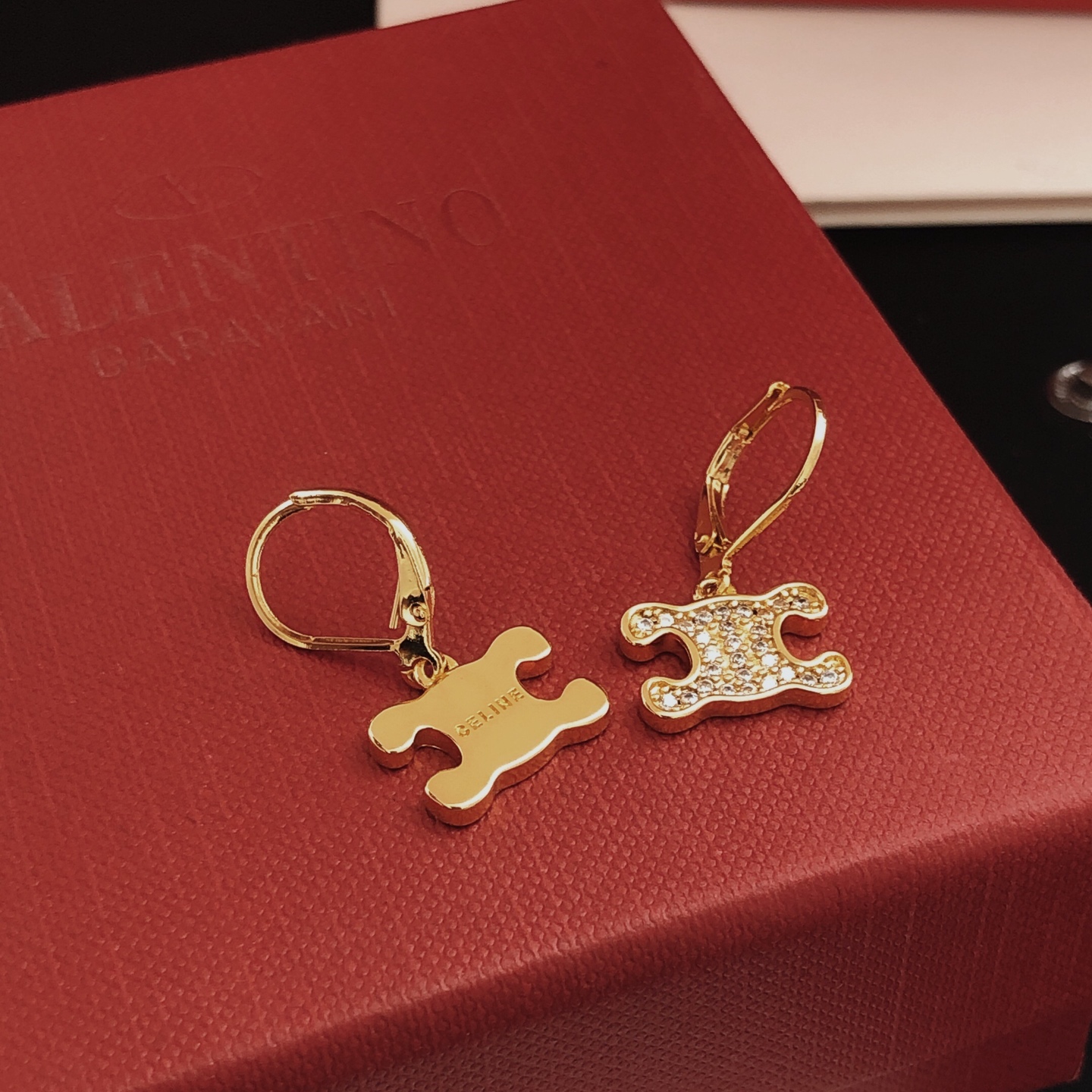 Celine Triomphe earrings gold-tone metal with clear crystal accents 1 5cm drop