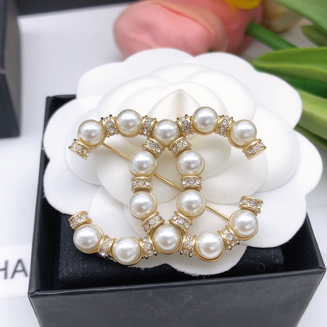 Chanel CC Pearl Crystal Brooch brooch gold tone metal white faux pearl clear crystal 3 5cm width