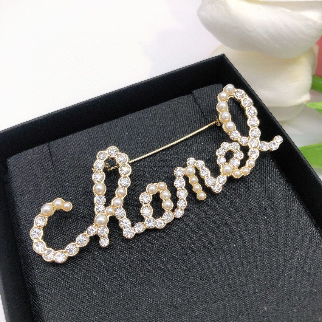 Chanel Cursive Script Logo Brooch brooch gold-tone metal clear crystal white faux pearl 6cm width