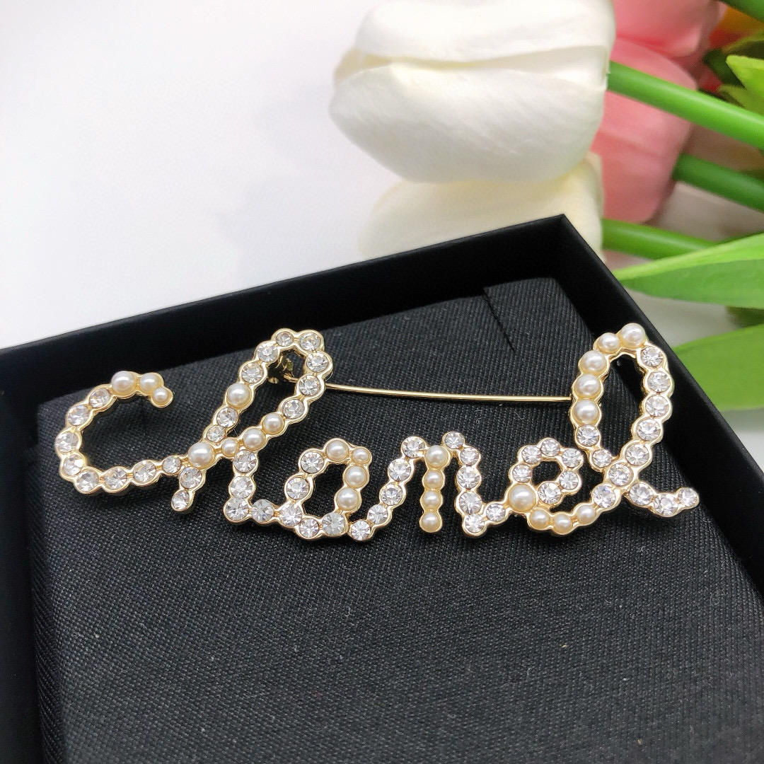 Chanel Cursive Script Logo Brooch brooch gold-tone metal clear crystal white faux pearl 6cm width