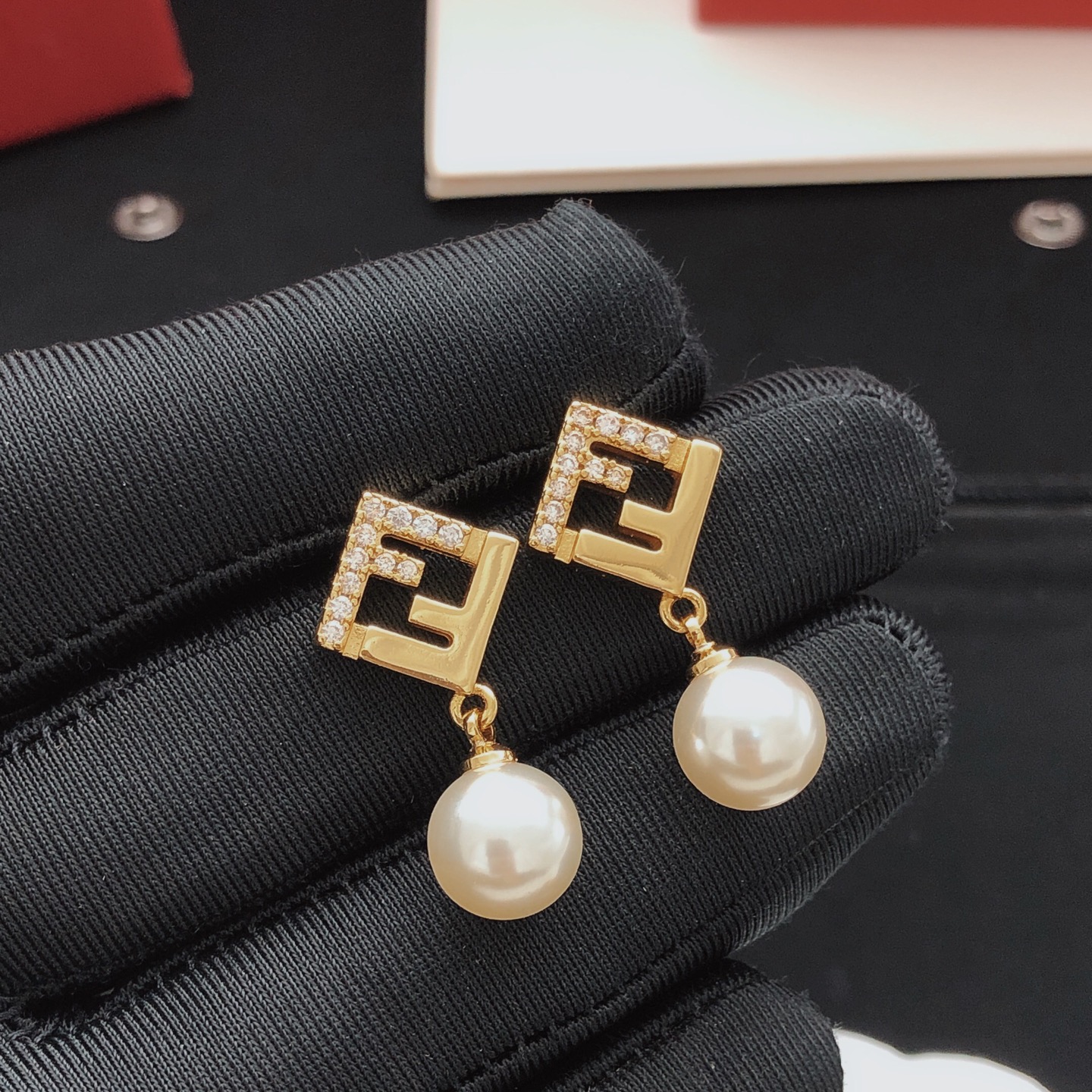 Fendi FF Logo Pearl Drop Earrings earrings gold-tone metal clear cubic zirconia cream white pearl 1 5cm drop length