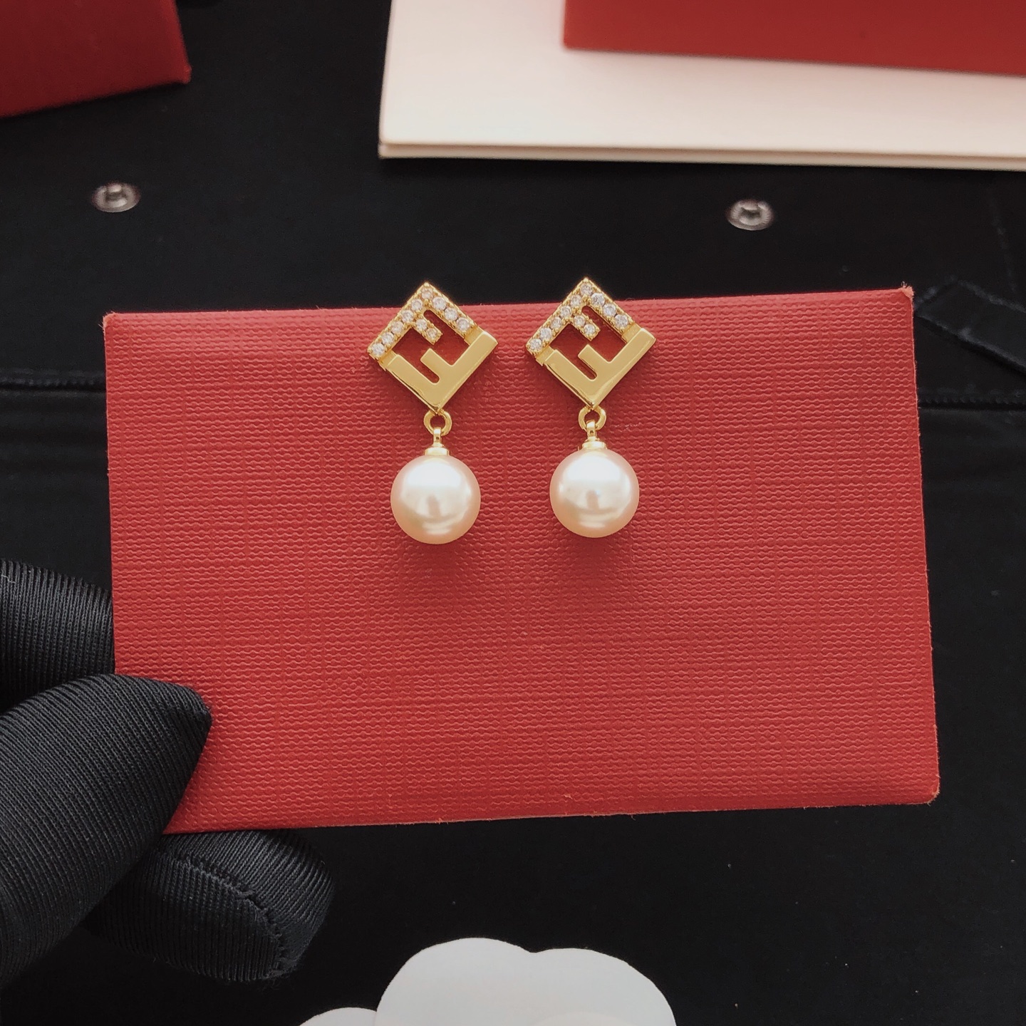 Fendi FF Logo Pearl Drop Earrings earrings gold-tone metal clear cubic zirconia cream white pearl 1 5cm drop length