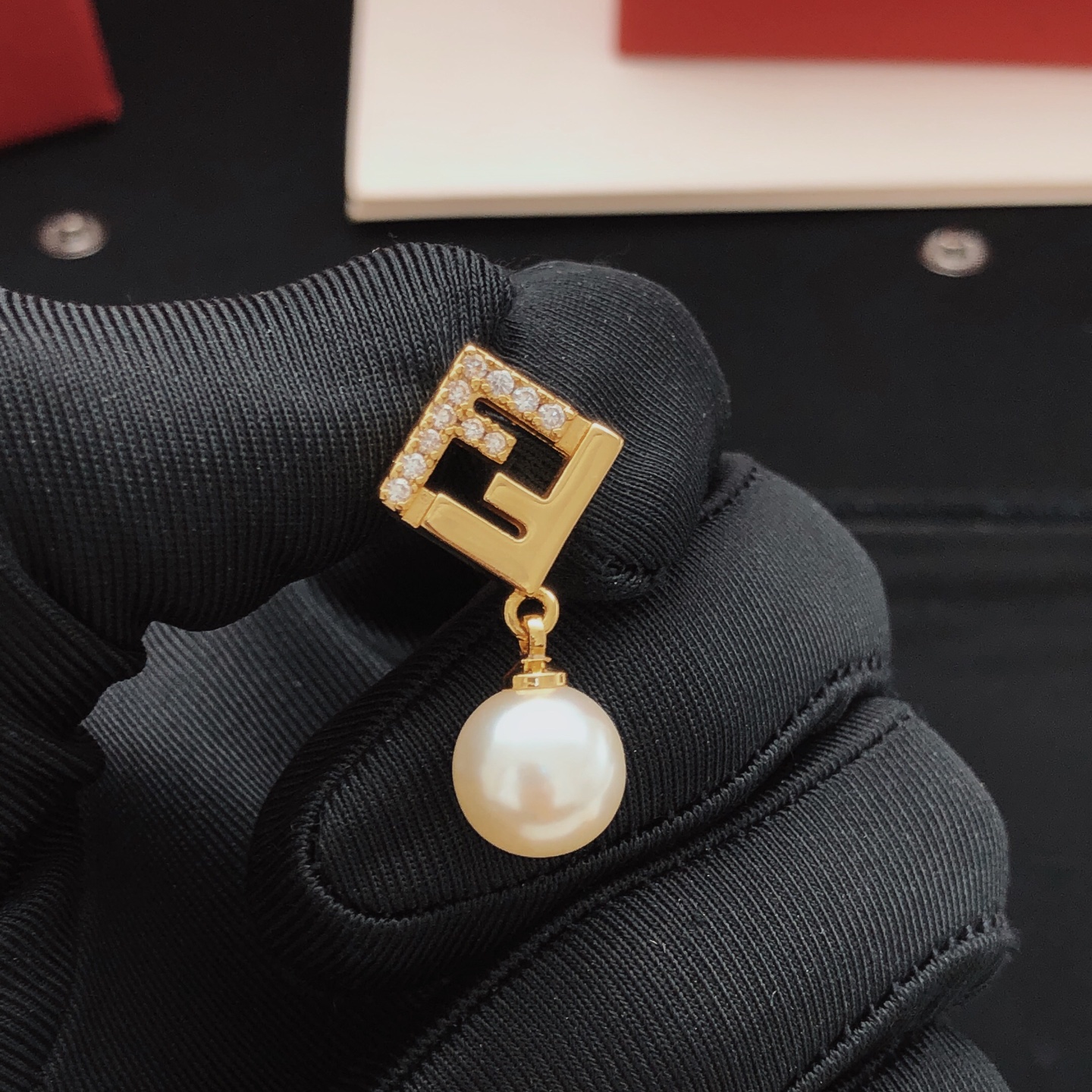 Fendi FF Logo Pearl Drop Earrings earrings gold-tone metal clear cubic zirconia cream white pearl 1 5cm drop length