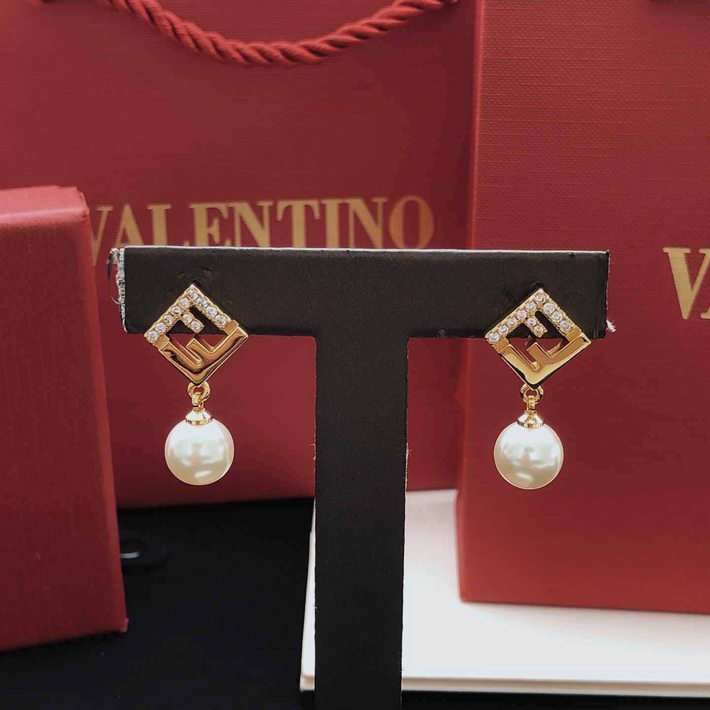 Fendi FF Logo Pearl Drop Earrings earrings gold-tone metal clear cubic zirconia cream white pearl 1 5cm drop length