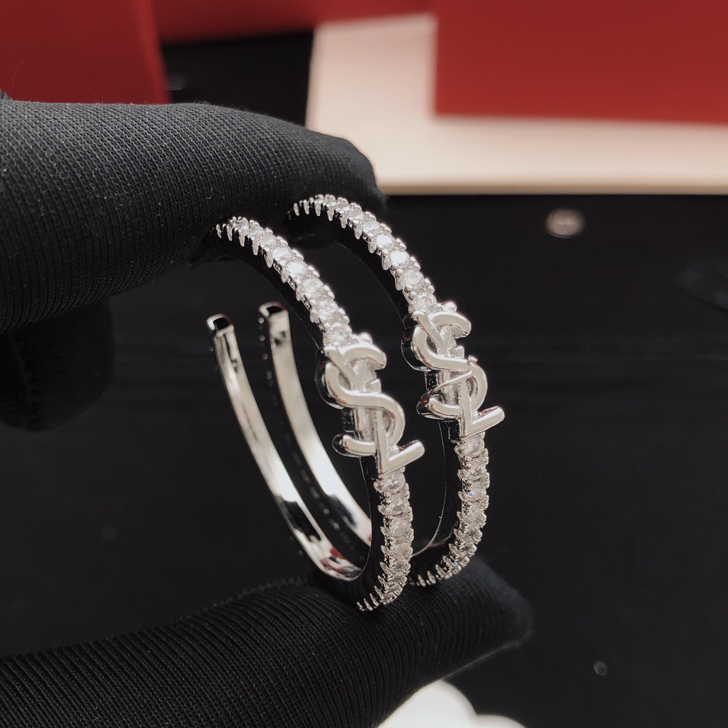 Saint Laurent Cassandre Crystal Hoop earrings silver-toned metal with clear crystal accents 3 5cm diameter