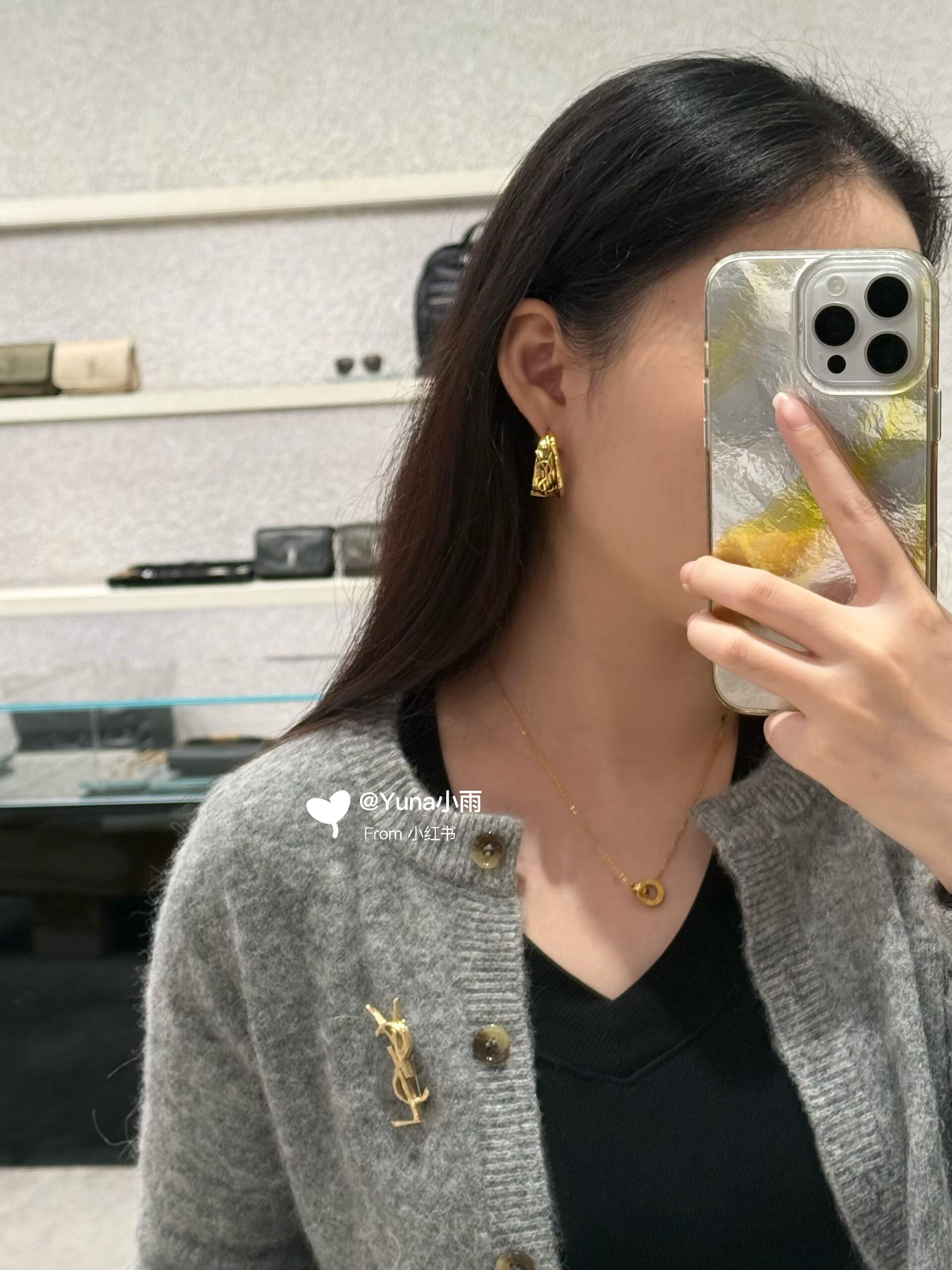 Saint Laurent Cassandre Twisted Hoop Earrings earrings vintage gold tone metal no gemstones 2 5cm hoop diameter