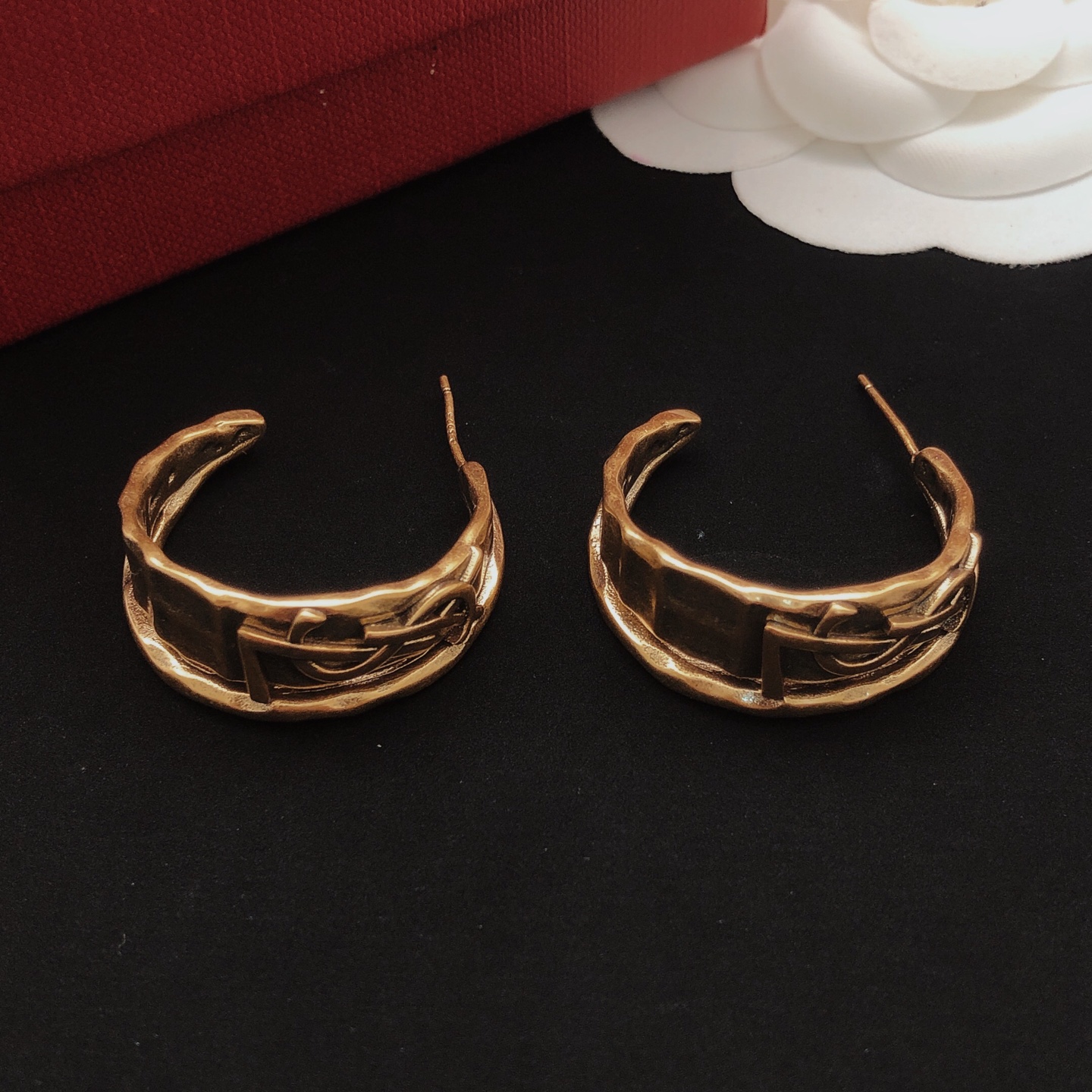 Saint Laurent Cassandre Twisted Hoop Earrings earrings vintage gold tone metal no gemstones 2 5cm hoop diameter