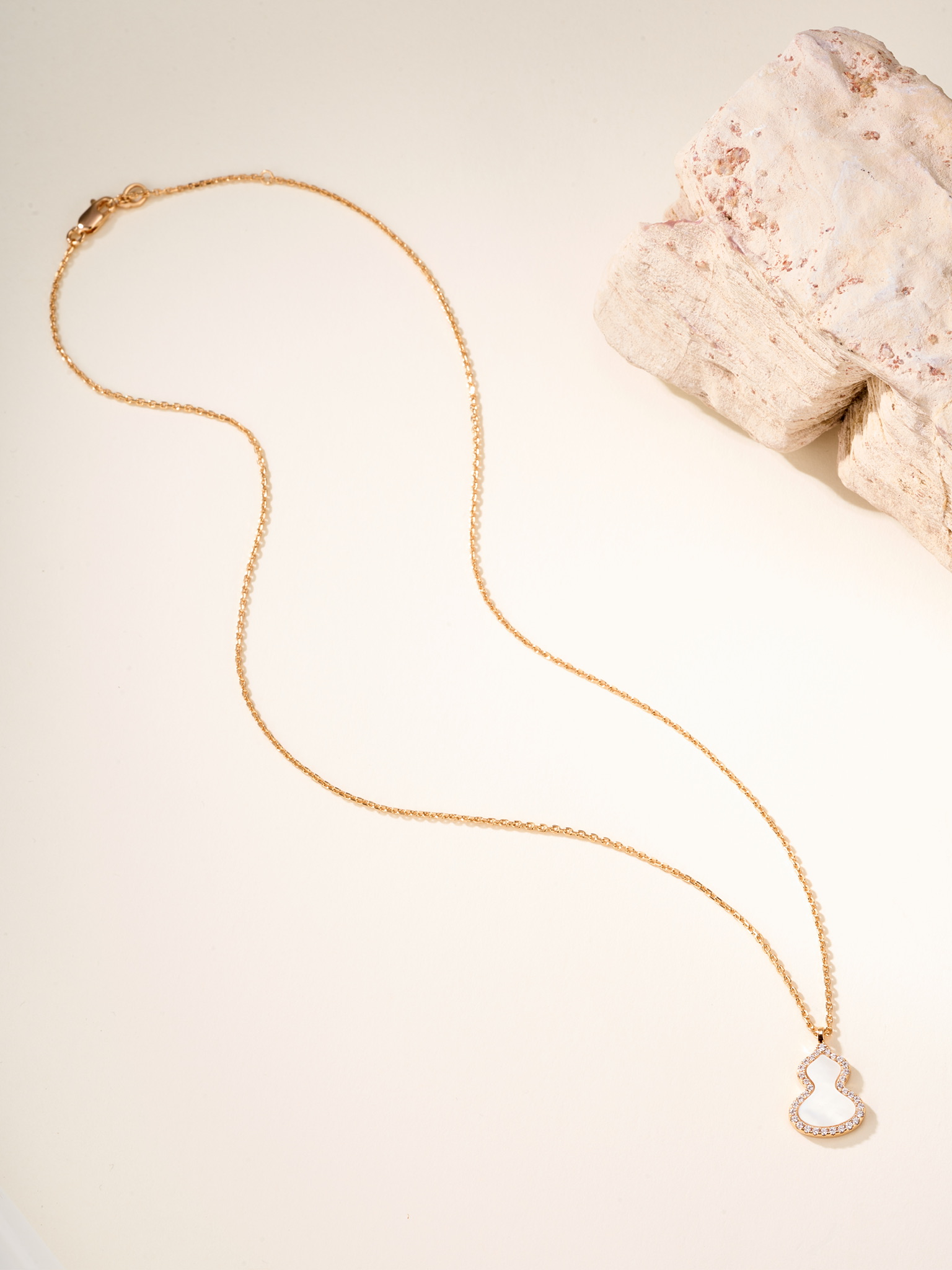Qeelin Wulu necklace Rose gold metal with red carnelian white mother-of-pearl green jade and clear diamond accents white gold metal with green jade and clear diamond accents 11 2 14 1mm pendant