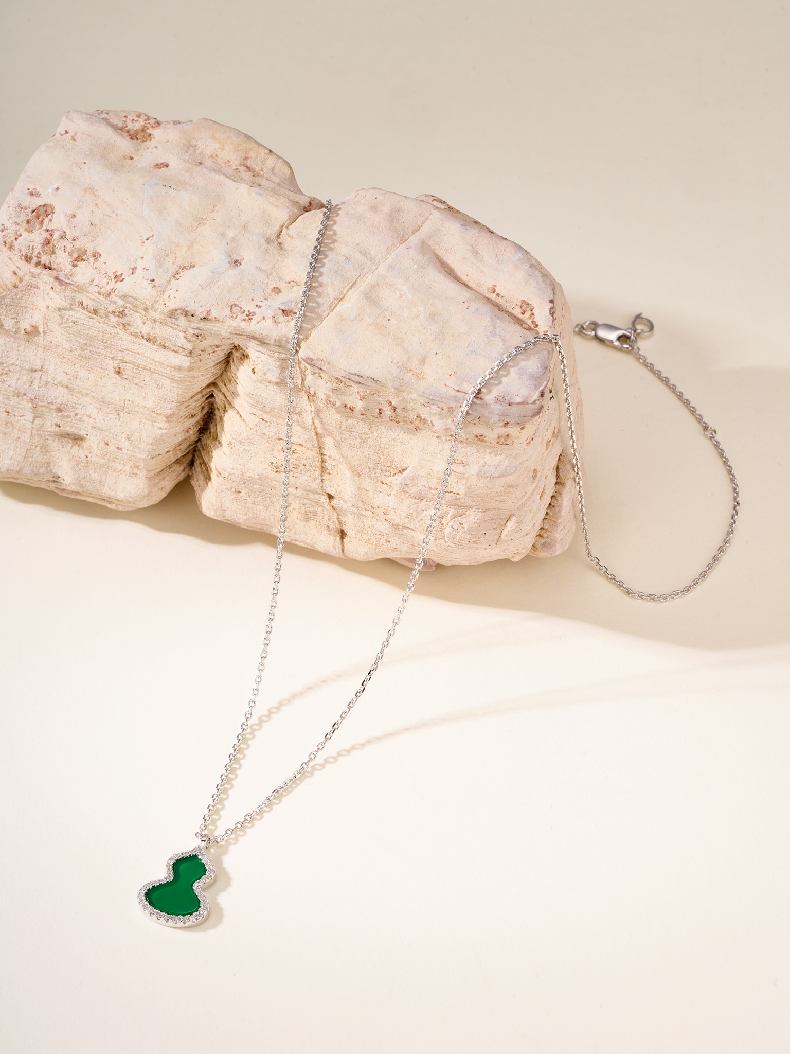 Qeelin Wulu necklace Rose gold metal with red carnelian white mother-of-pearl green jade and clear diamond accents white gold metal with green jade and clear diamond accents 11 2 14 1mm pendant